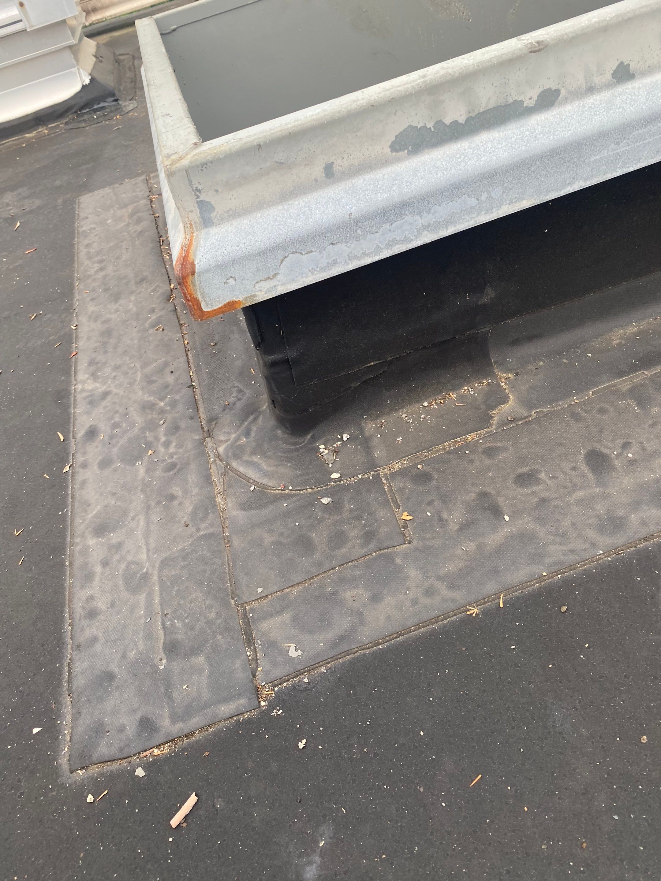 Lorton: EPDM Flat Roof with Partial Slate Replacement by RM Banning, Inc.