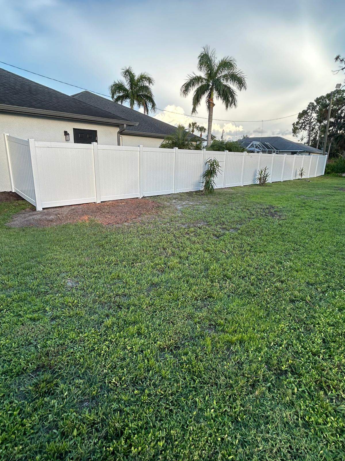 White Vinyl Privacy Fence and Chain Link Installation in North Port by True Fence LLC