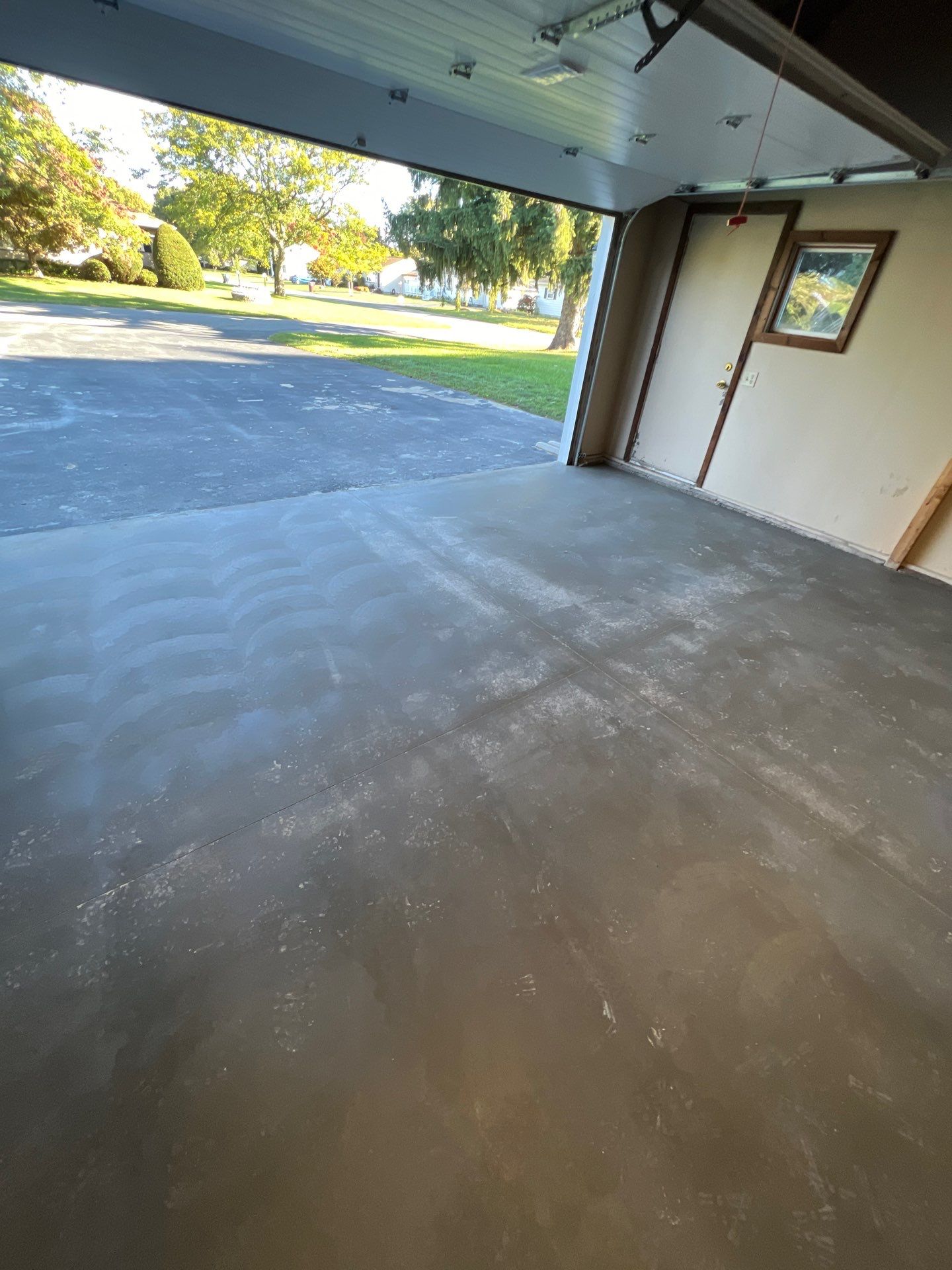Concrete garage floor replacement and wall repair by NG Masonry & Construction LLC