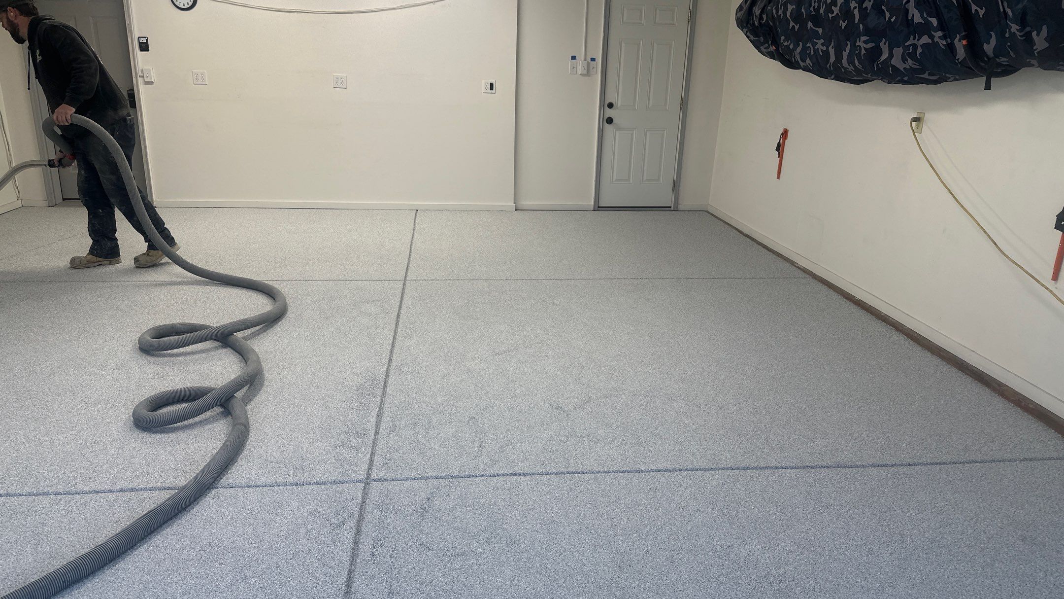 Garage Transformation using 1/8 Tidal Wave by Croc Coatings, LLC