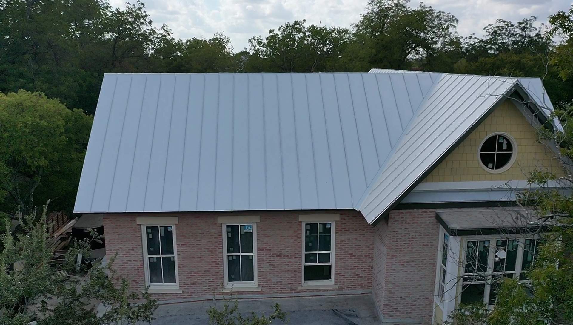 Residential Metal Roof Installation using McElroy Metal by Premier Roofing and Contracting