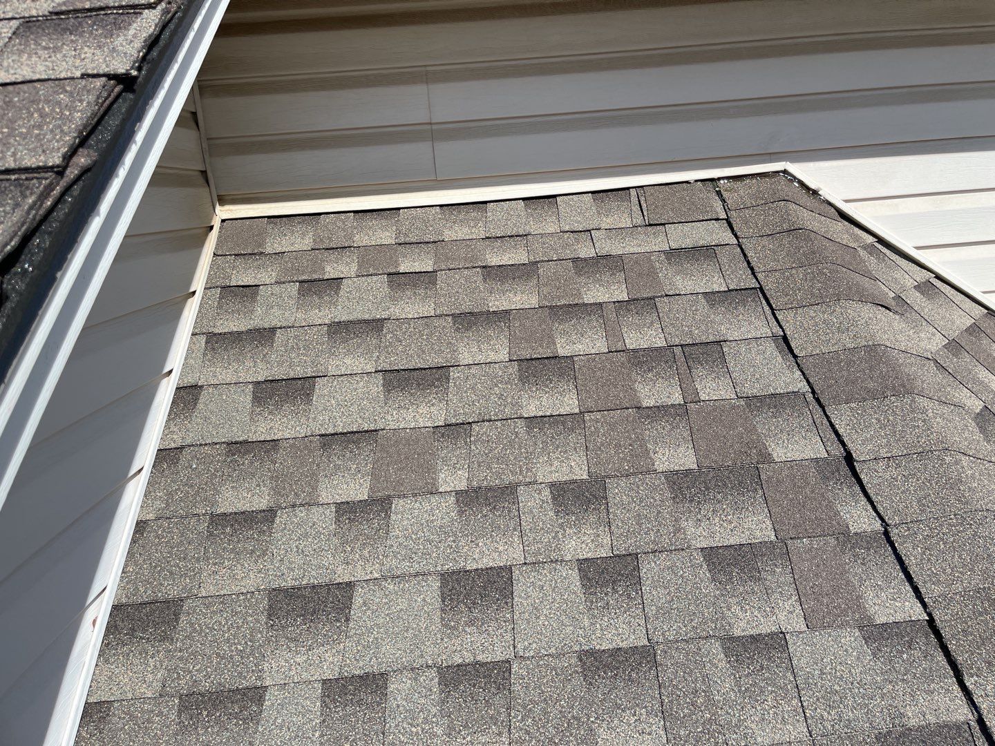 Major storm damage required full roof replacement along with other exterior repairs by First United Roofing & Construction