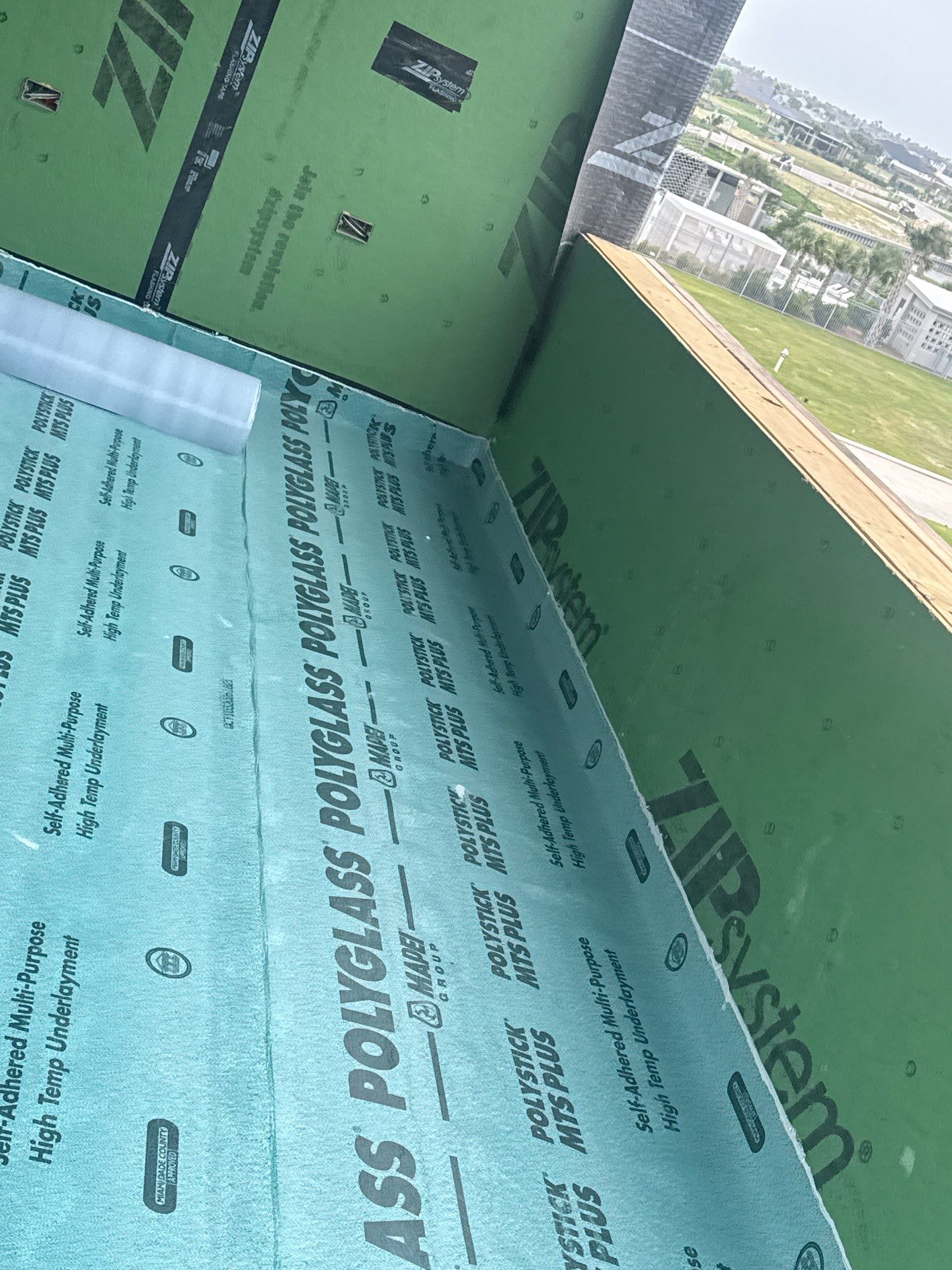 Walk Out, Island Style by Bayfront Roofing and Construction