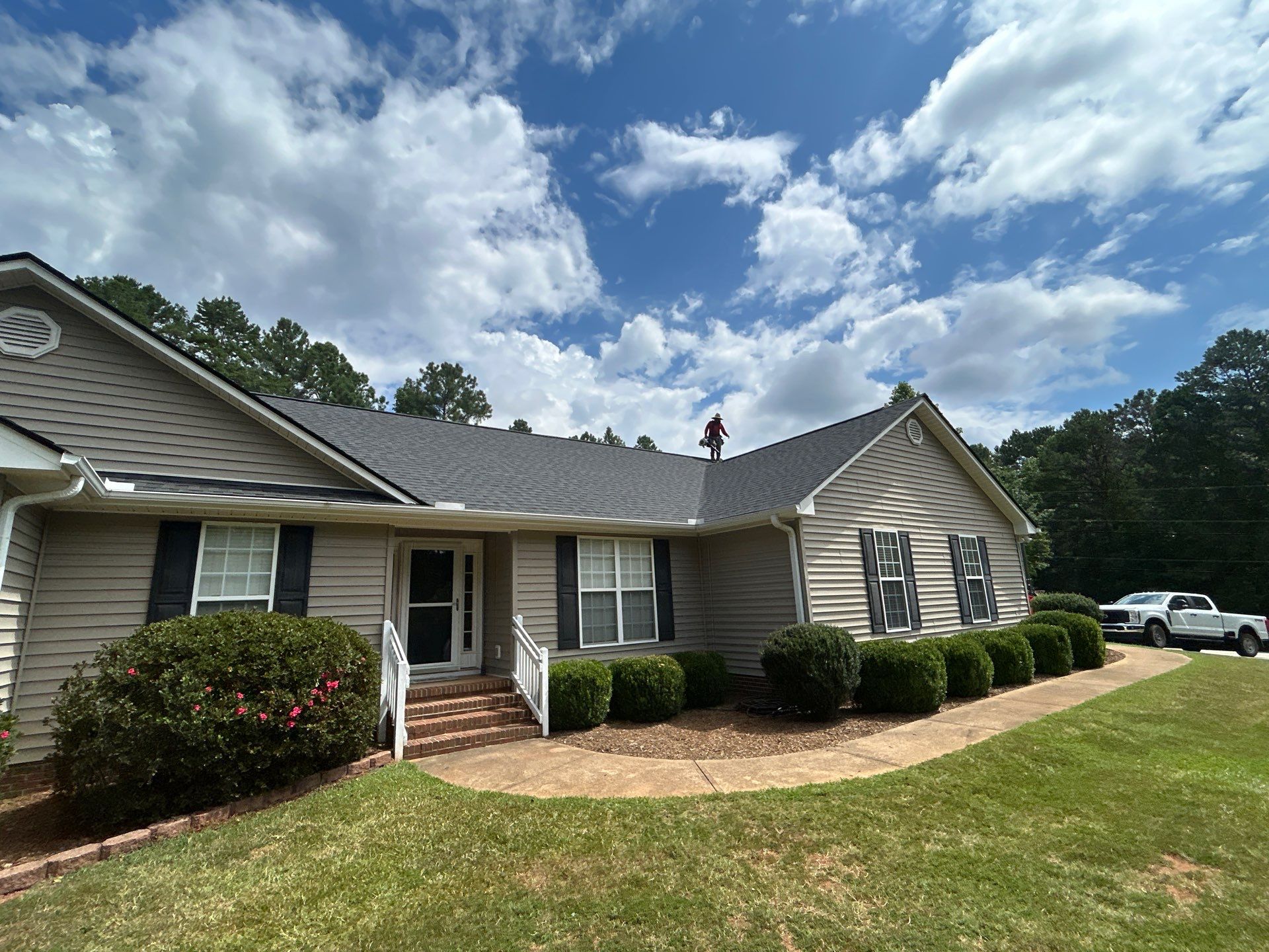 Residential Roofing Installation using CertainTeed Moire Black by Roofsters