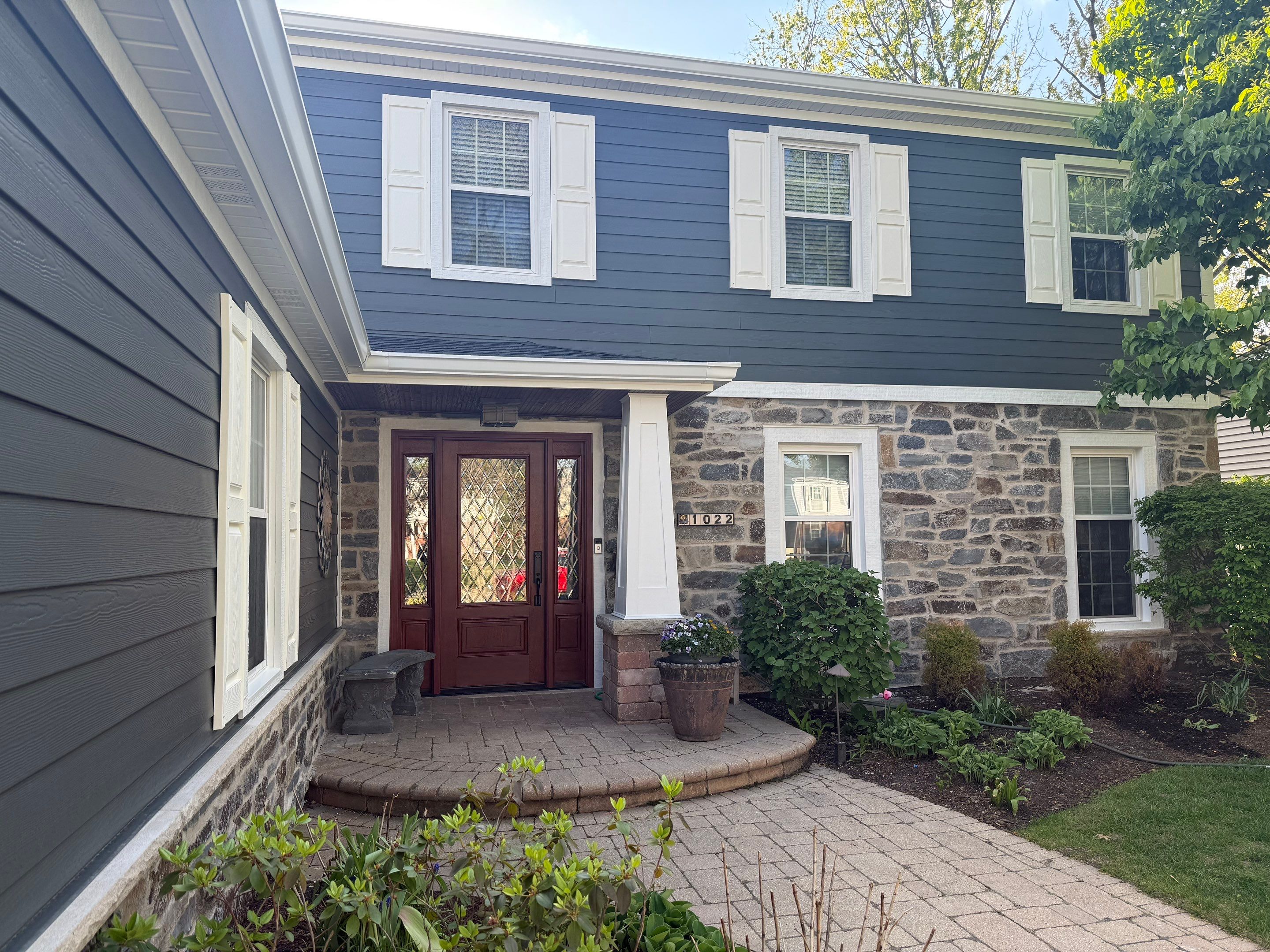Exterior Renovation with James Hardie Siding and Natural Stone in Lombard