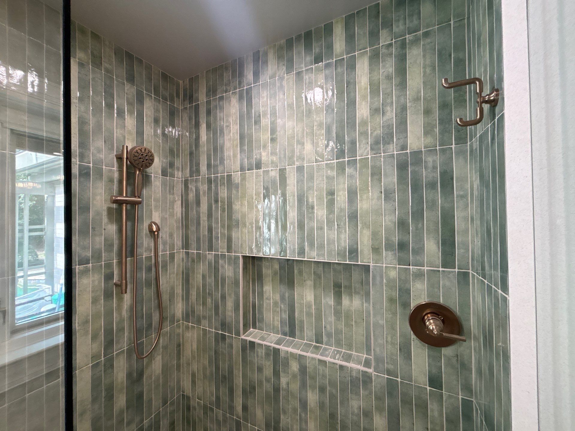 Finished Tiled Bathrooms by Next Step Contracting