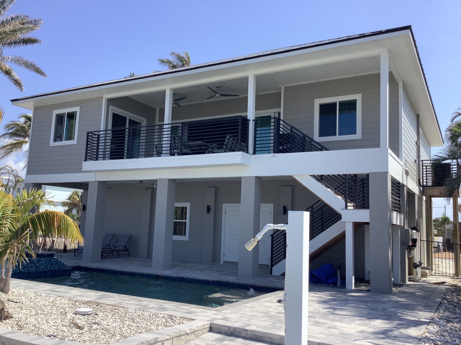 Custom Black Seamless Gutter in Fort Myers Beach FL by Gutter Professors
