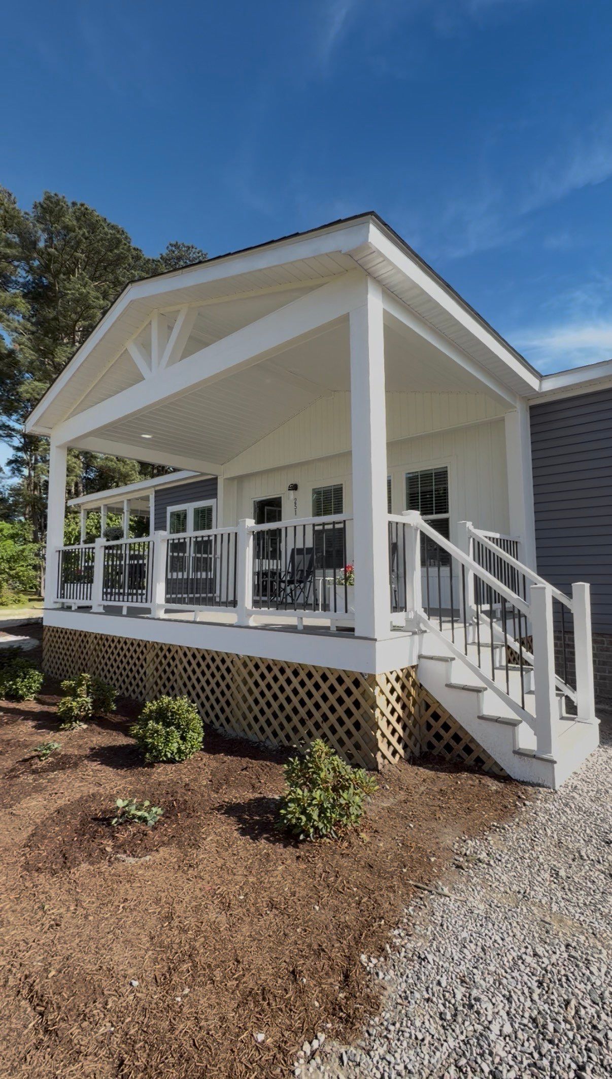Custom Trex Covered Deck and Gabled Roof in Winterville by The Remodeling Company