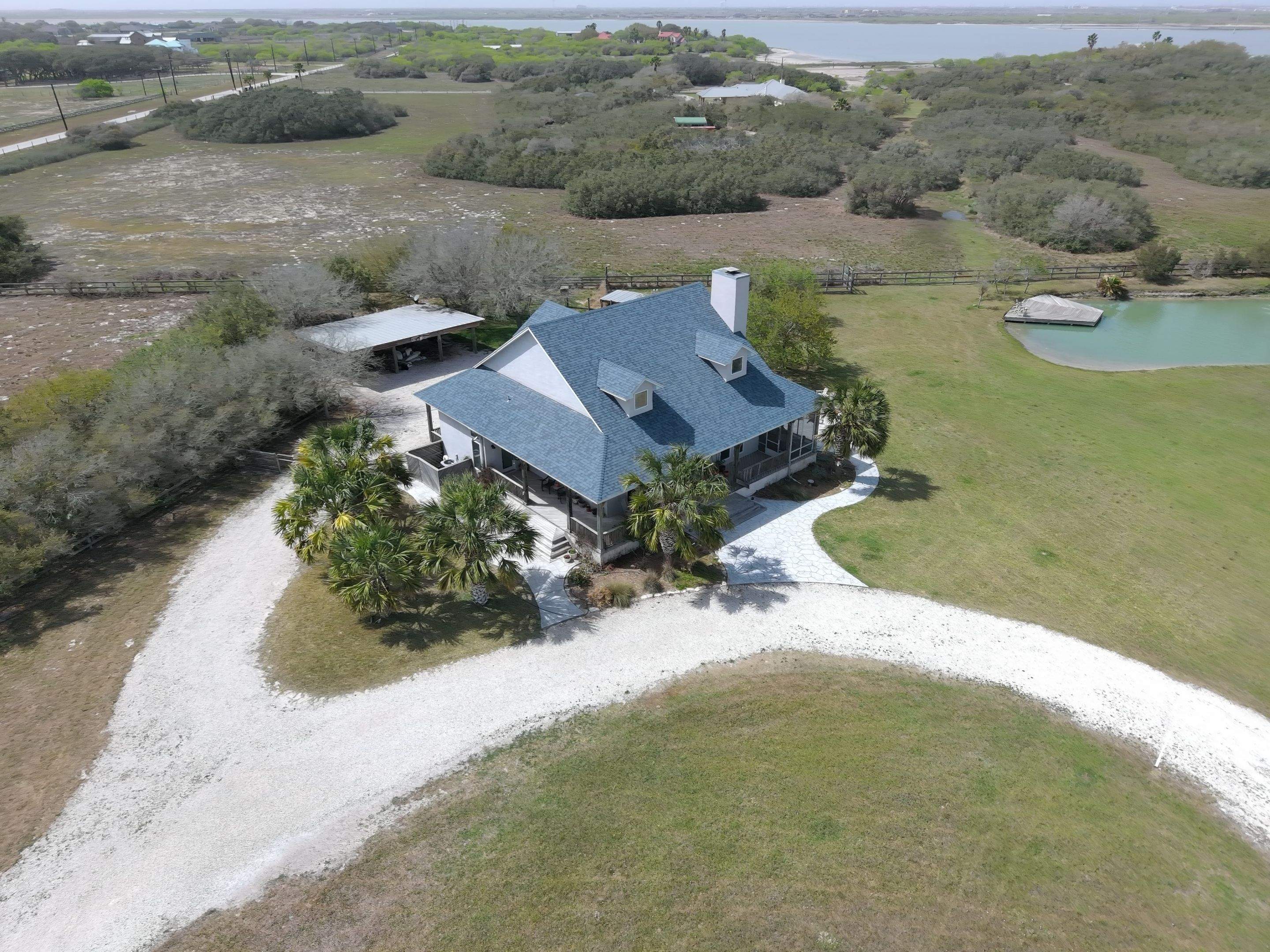 Long Horn Retreat by Bayfront Roofing and Construction