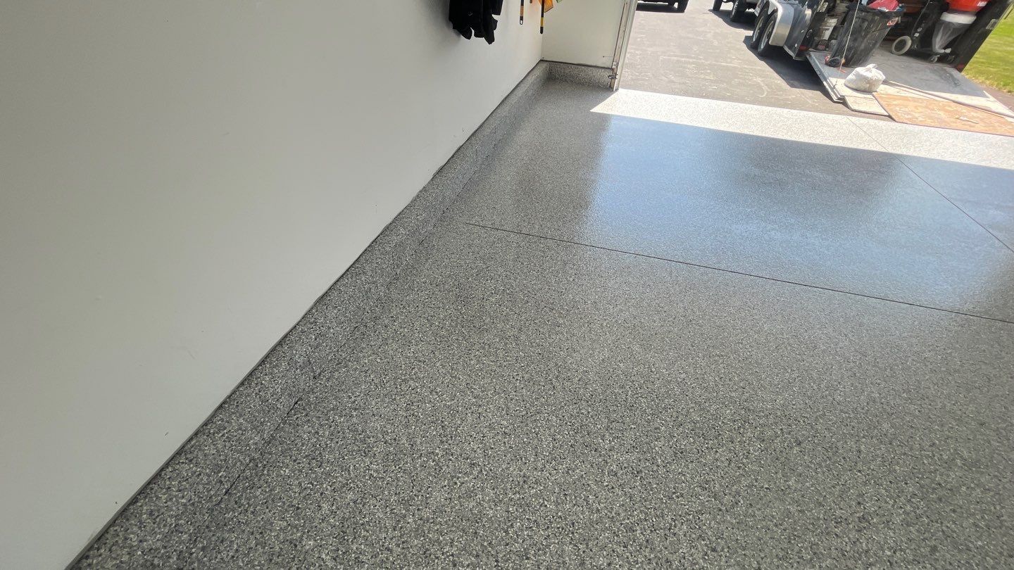 Garage in Londonderry, NH 03053 by Symphony Concrete Coatings