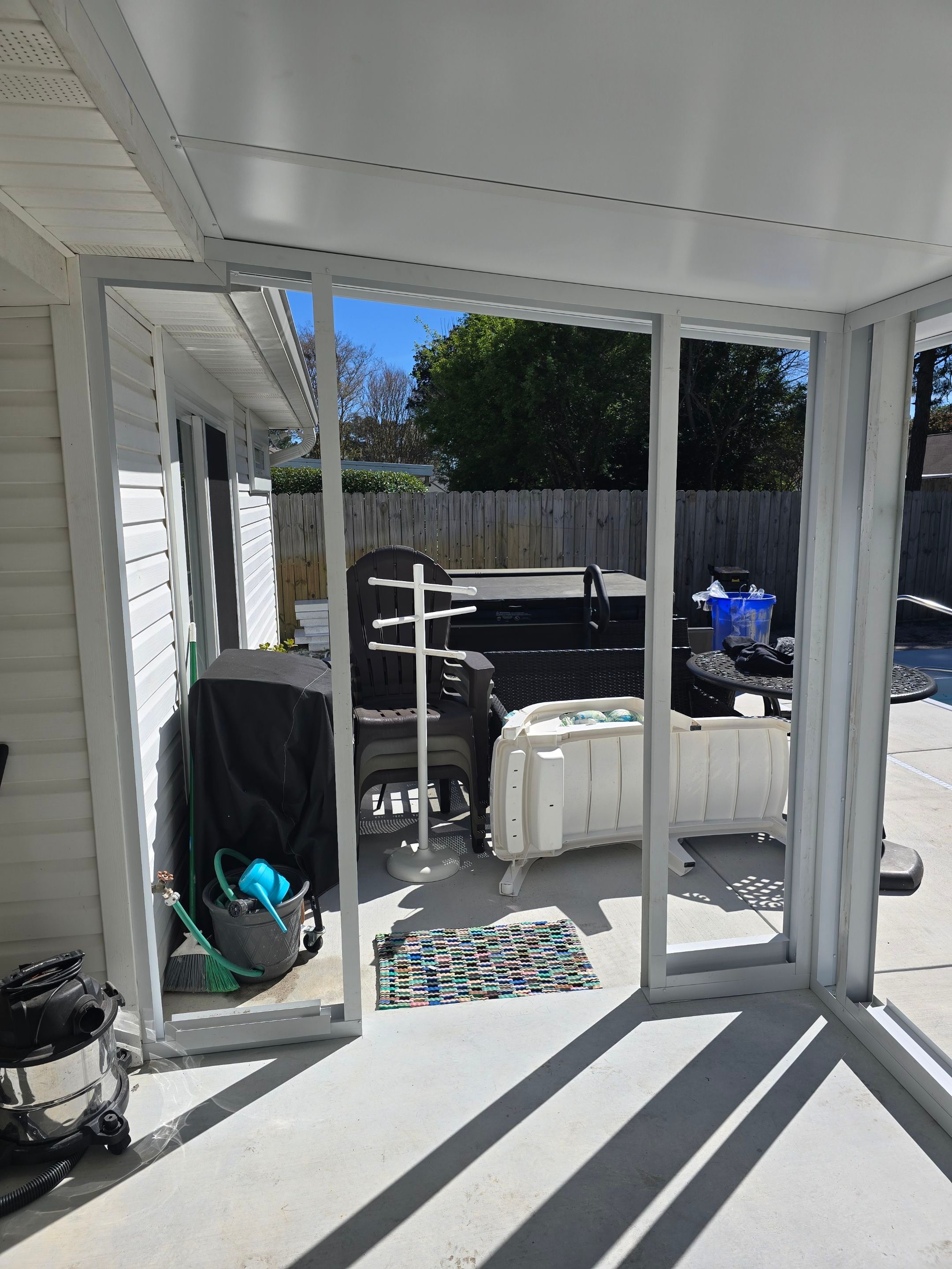 Poolside Glass Room in Gulf Breeze by Titan Sunrooms