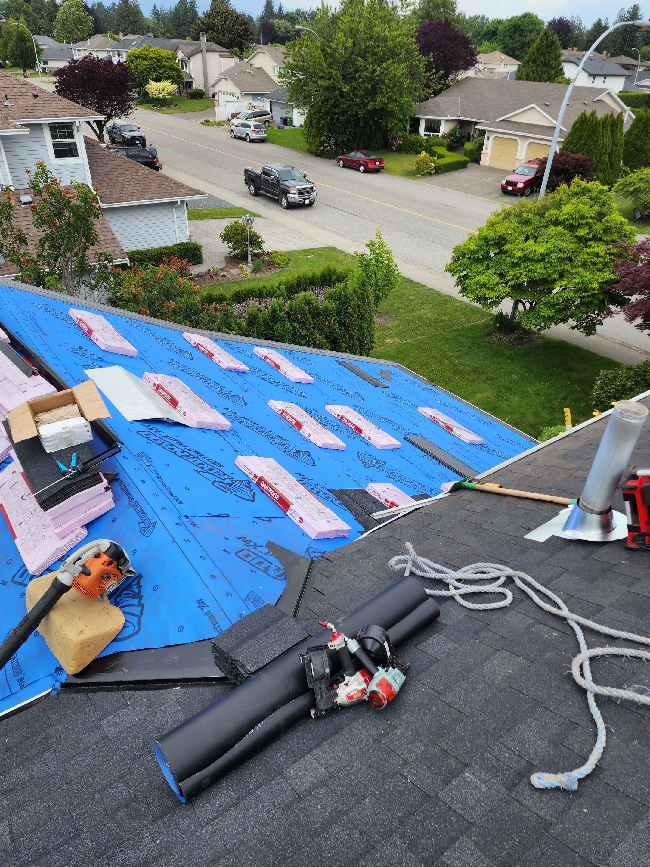 Residential Cedar ReRoofing Installation using OC Oakridge shingles by Top Notch Roofing Inc