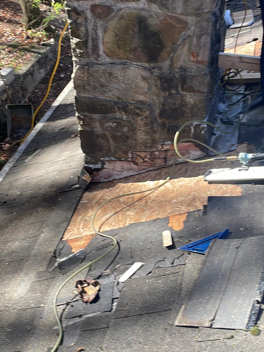 Insurance repair and chimney saddle installation. by Teflon Roofing