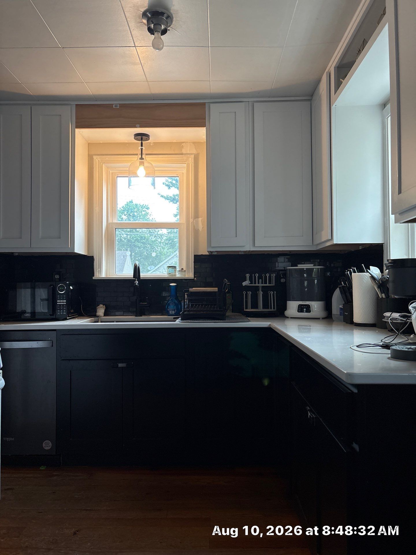 Modern Kitchen Renovation with Black and White Cabinetry in Lincoln by CompanyCam Sales Demo