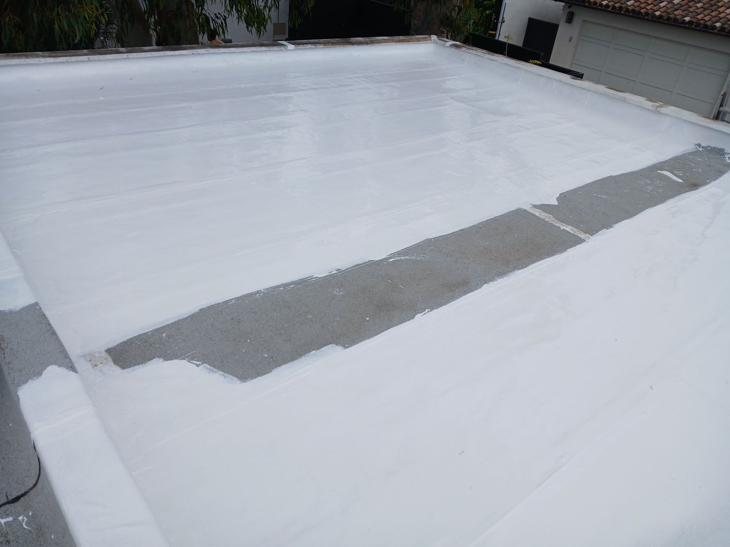 Silicone Membrane Installation using American Standard Coatings Silicone-S by Hull Brothers Roofing