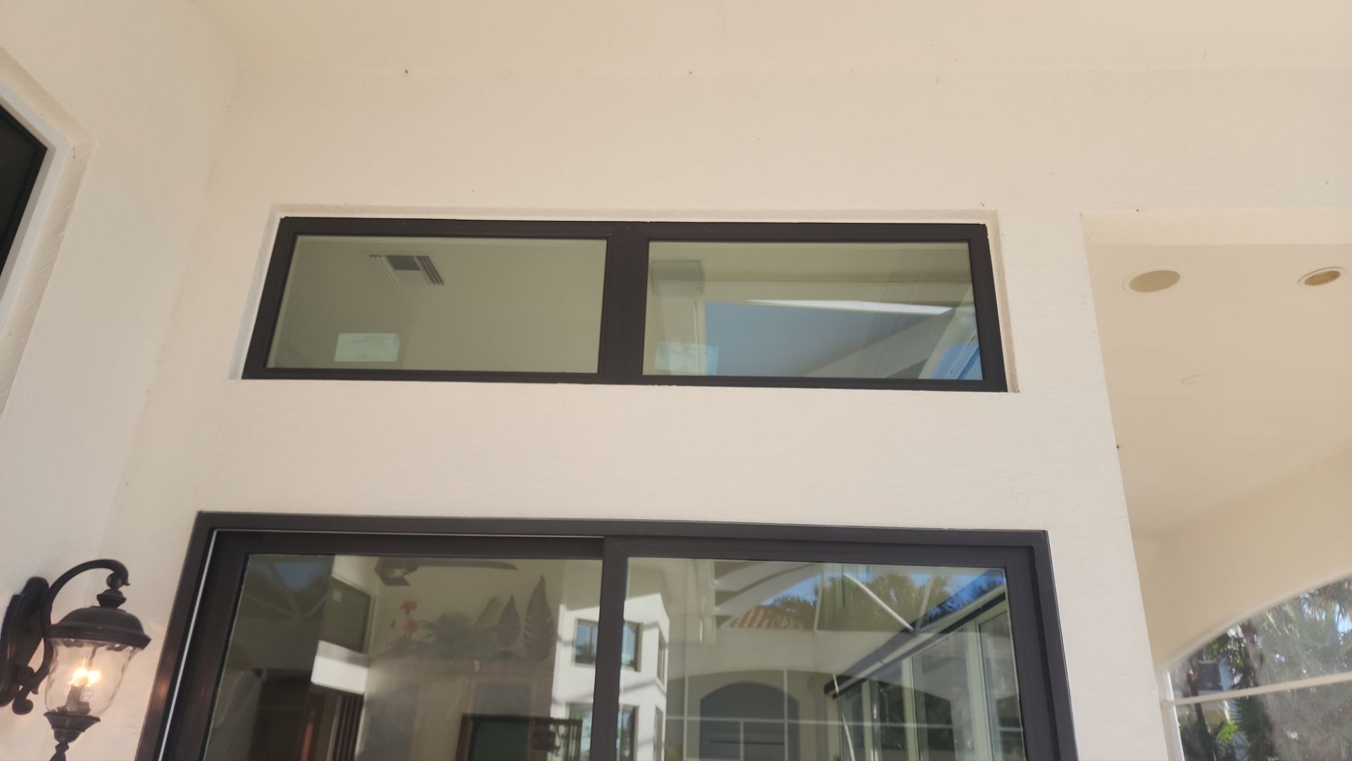 Window Installation using PGT Vinyl White-Bronze by Windows For Life 