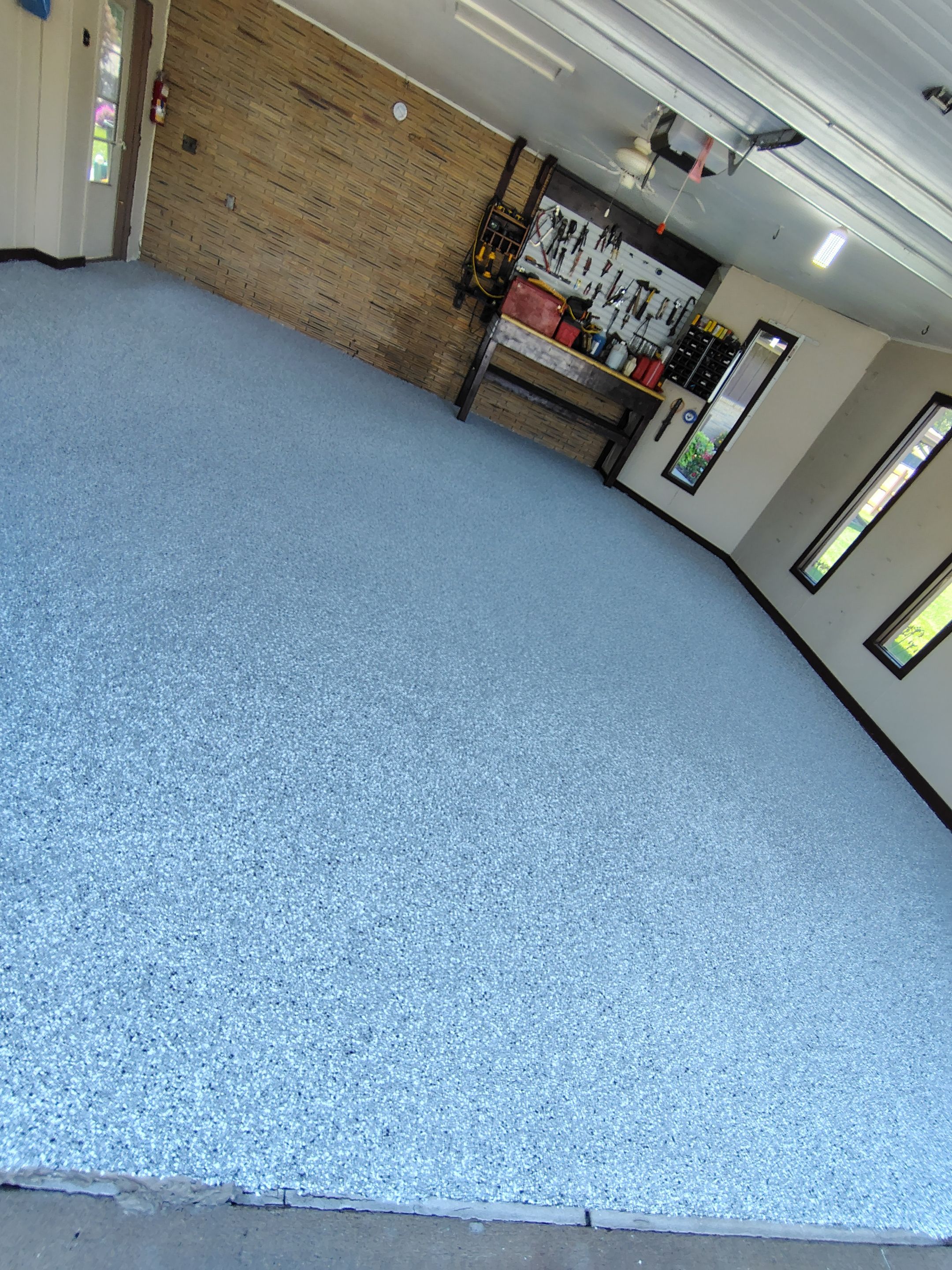 Garage Floor Coating with Crack Repair in Yankton by Select Painting, Coatings & Garage Cabinets