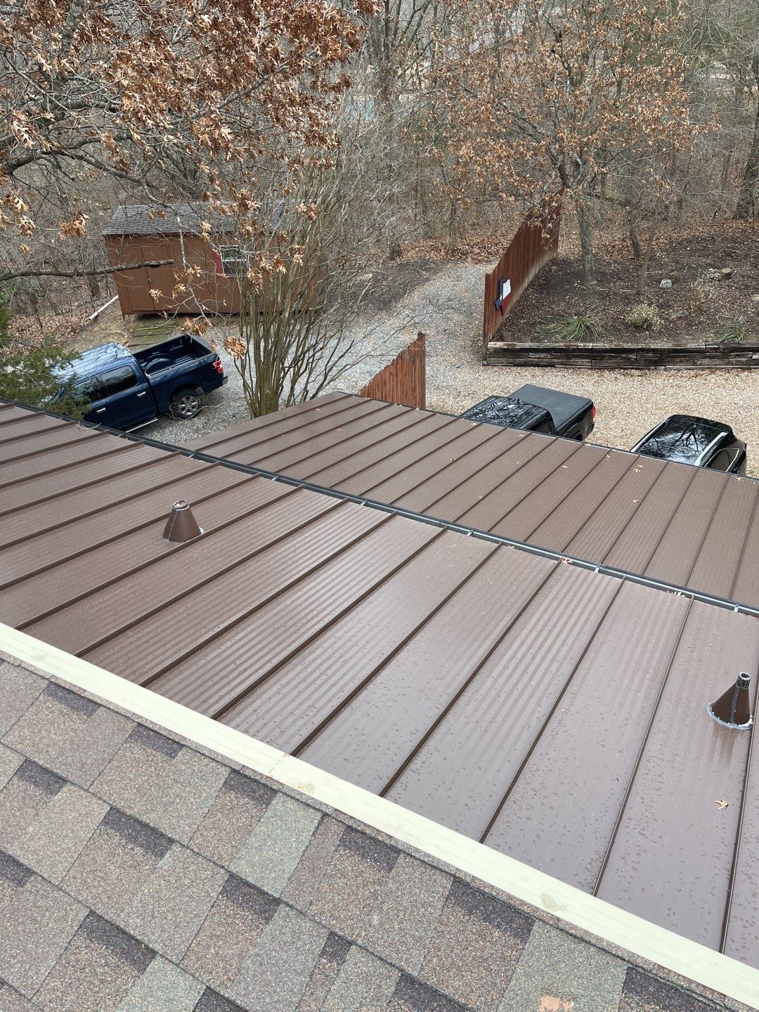 Residential Roofing Installation using Standing Seam Metal Roofing and Composition Shingles by Rainy Day Restoration