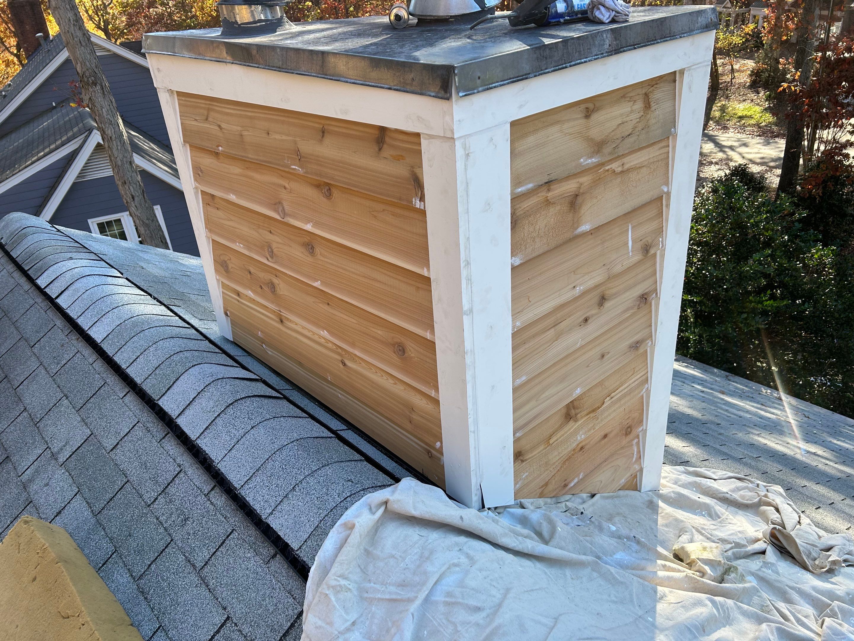 Roof Repairs/Chimney Siding  by Pro Performance Roofing