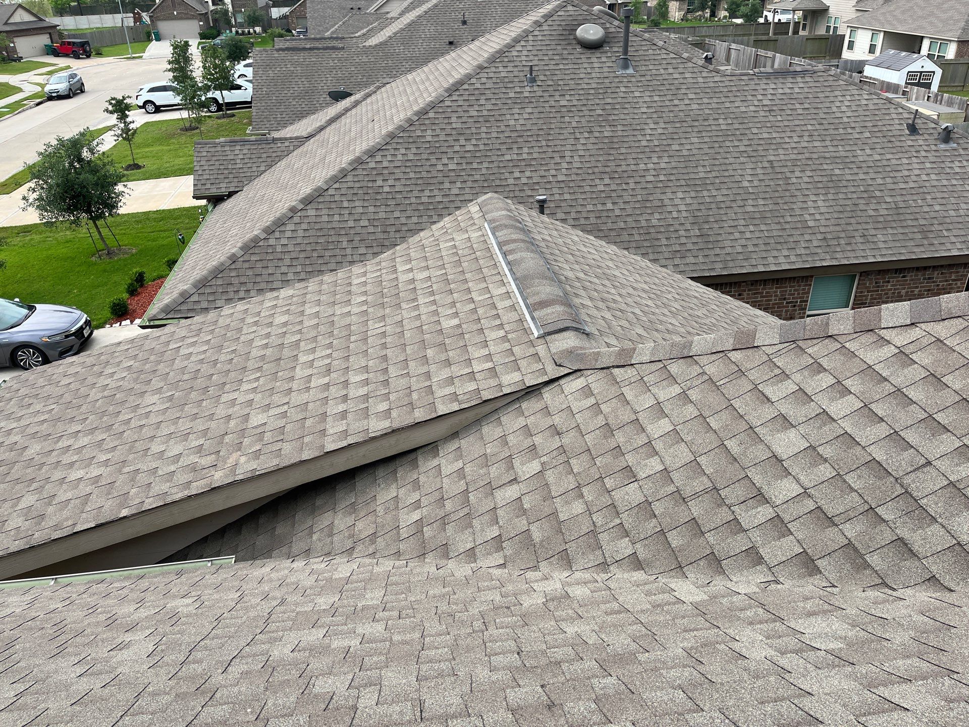 Hail Damage using Owen's Corning Duration (Lifetime) Shingles by Roof Repair Company