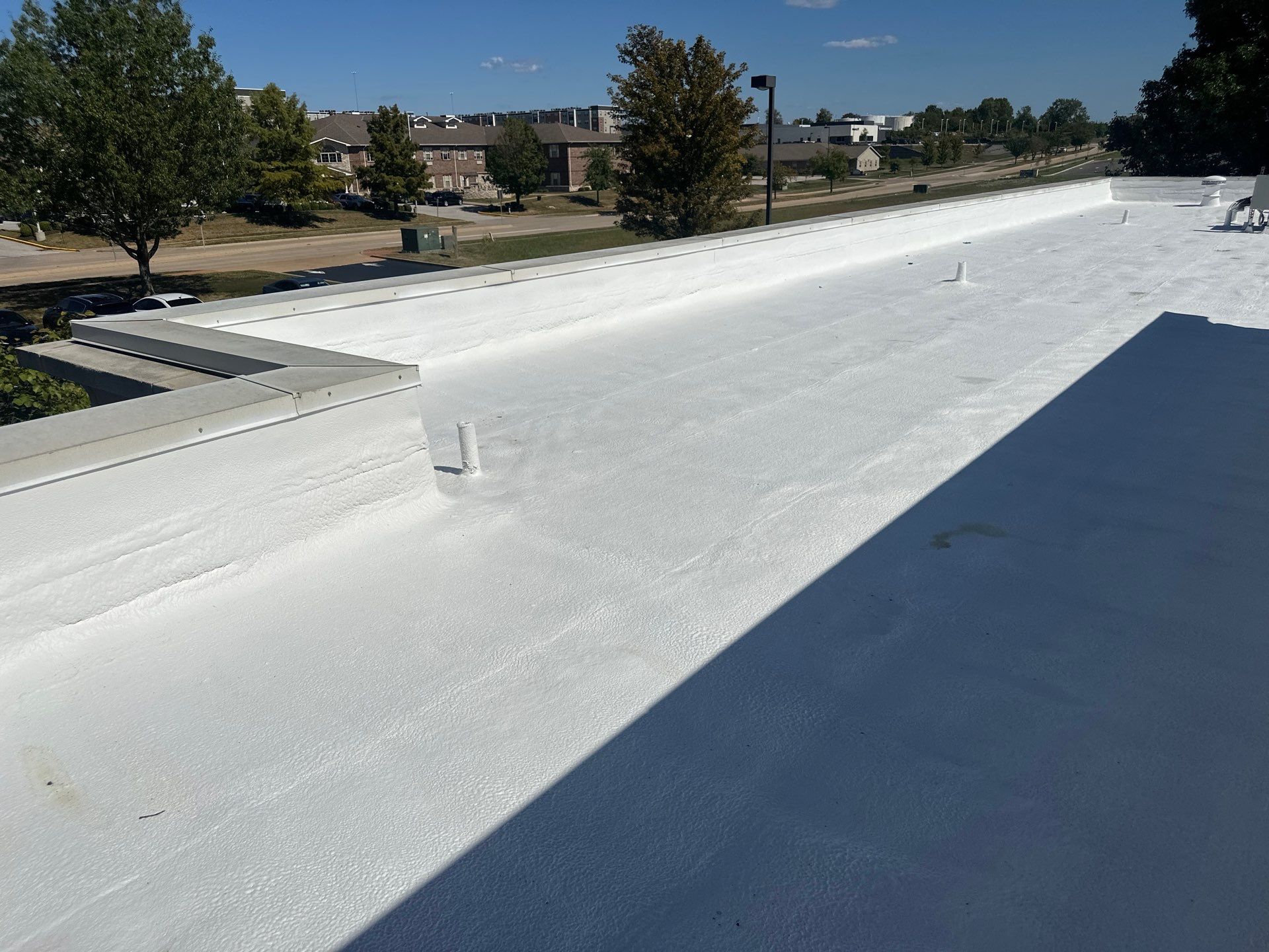 Commercial Roofing Install - SPF Foam & Coatings Restoration & EPDM System - Color White  by Titan Commercial & Residential Roofing 
