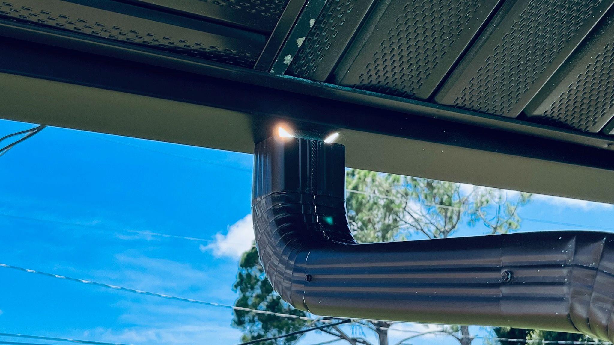 Aluminum Downspouts and Elbows in Englewood FL by Gutter Professors