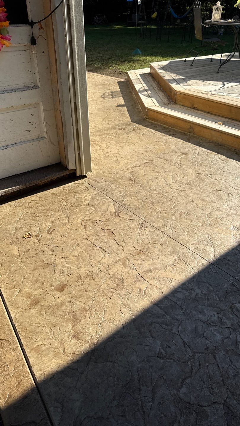 Oxford slate stamped patio  by NG Masonry & Construction LLC