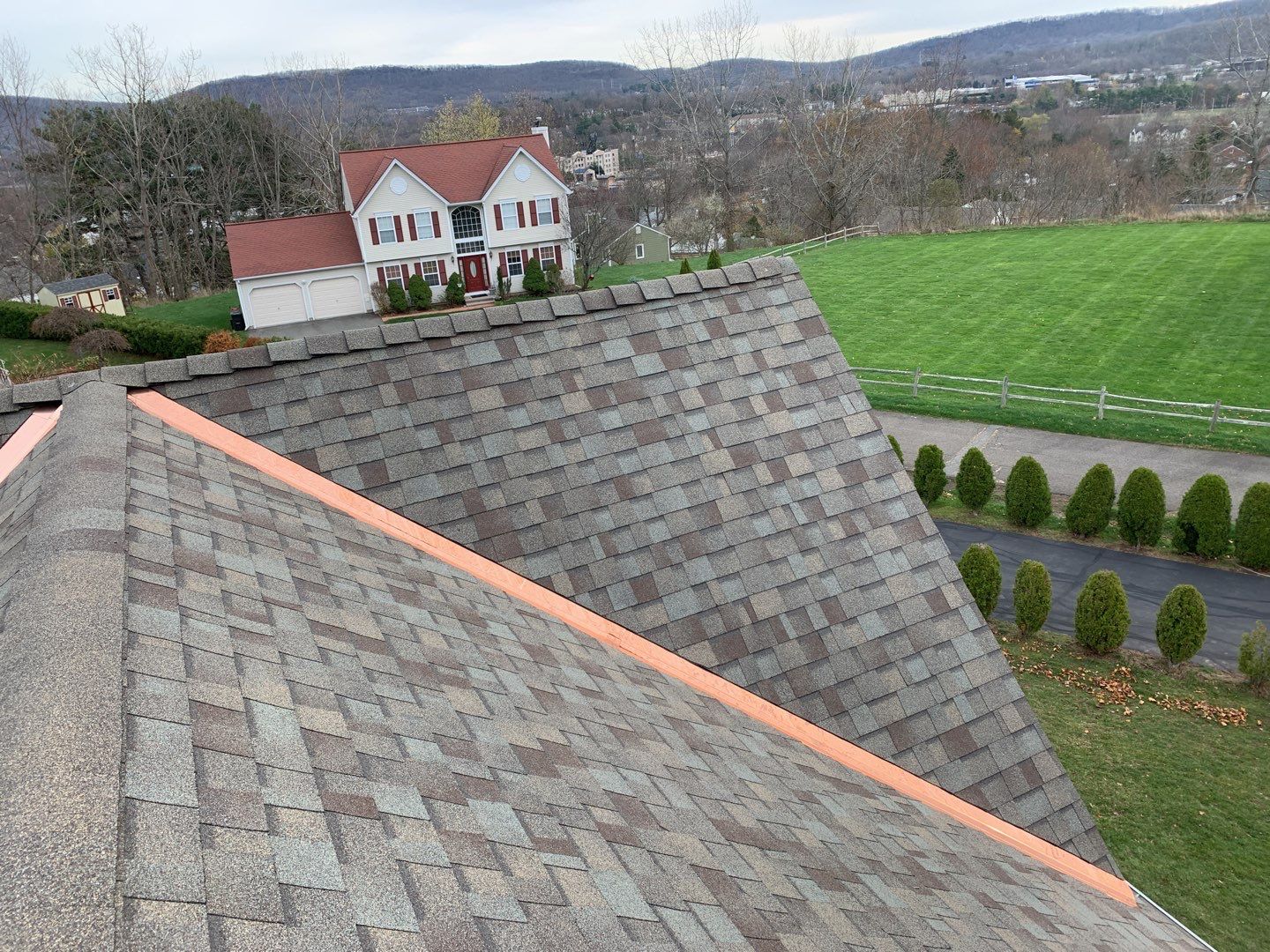 Commercial Roofing Installation using Owens Corning TruDefinition driftwood by A Plus Exterior