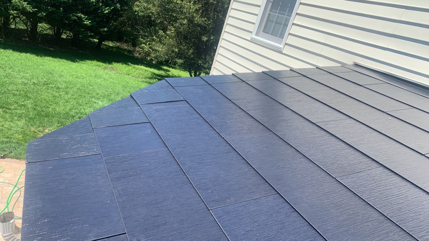 Tesla Solar Roof Replacement using Tesla Solar Roof V3 tiles by American Home Contractors