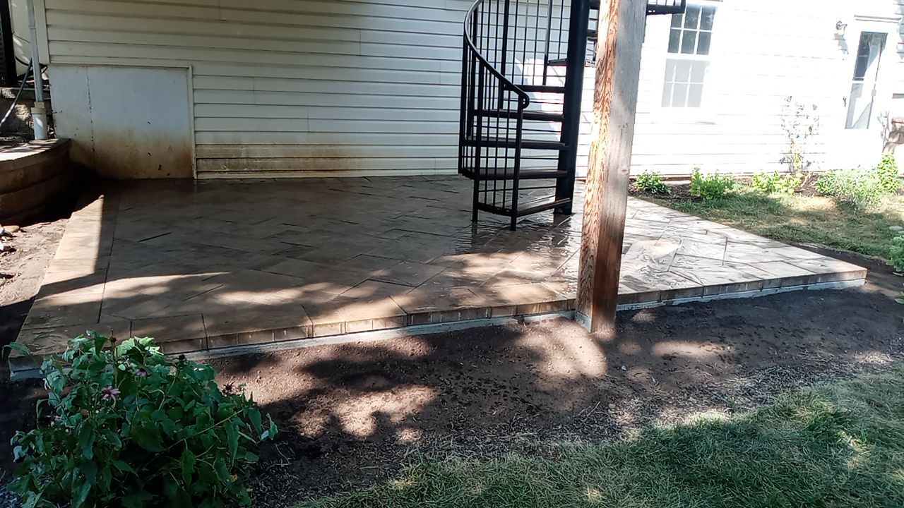 Back Yard Paver Patio by LAND ESCAPES LLC