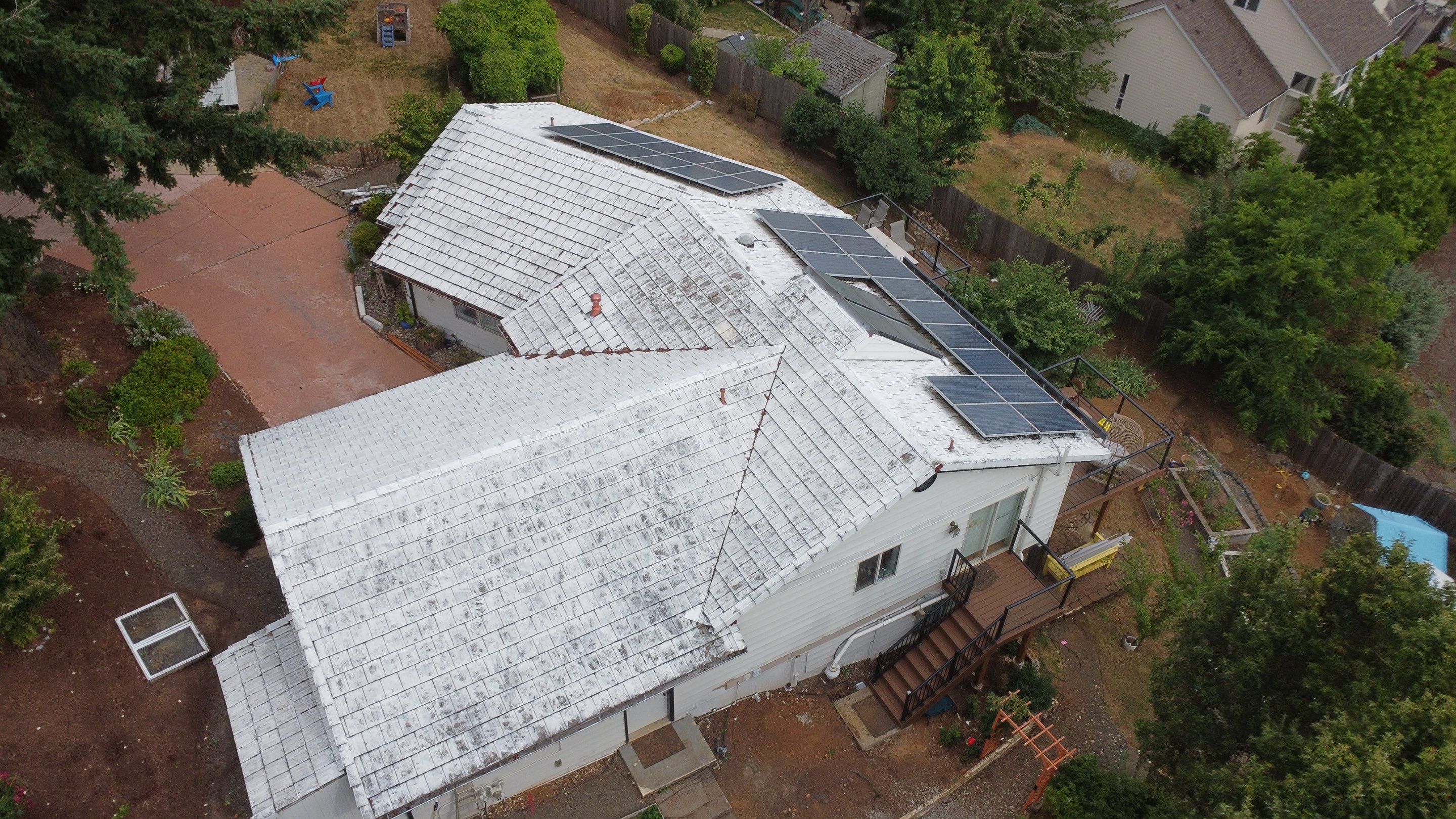 Granite Black Residential Roof Replacement by Orezona Building & Roofing Company, Inc.