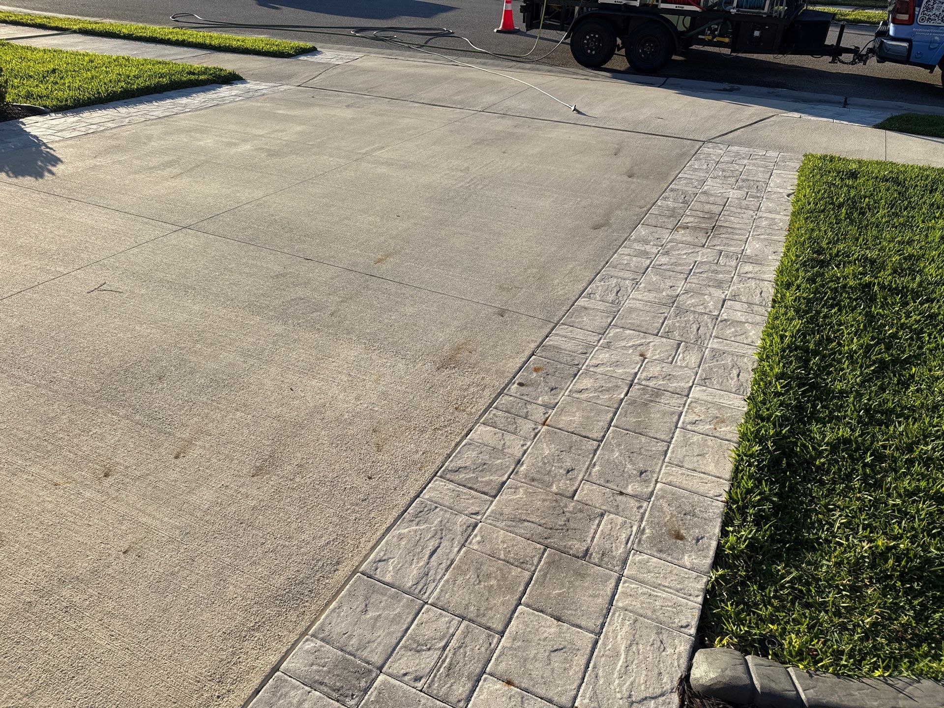 Rust Stain Removal from Concrete Driveway and Pavers in Park East at Azario | Lakewood Ranch, FL by Sunshine AquaWash