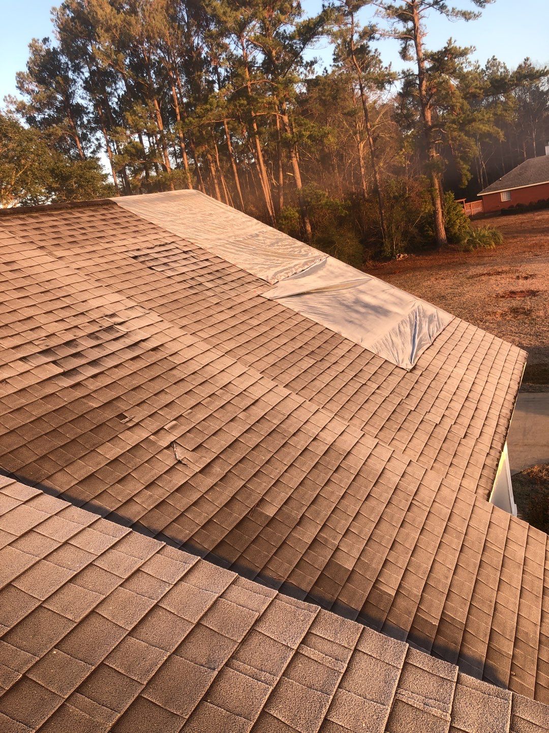 Residential Roofing Installation using Roof Replacement by American Roofing & Construction LLC