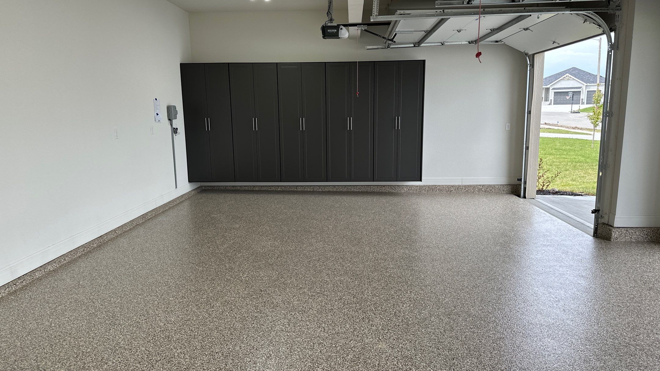 Ron B. upgraded his garage with cabinets and a Banner Garage Floor by Banner Garage