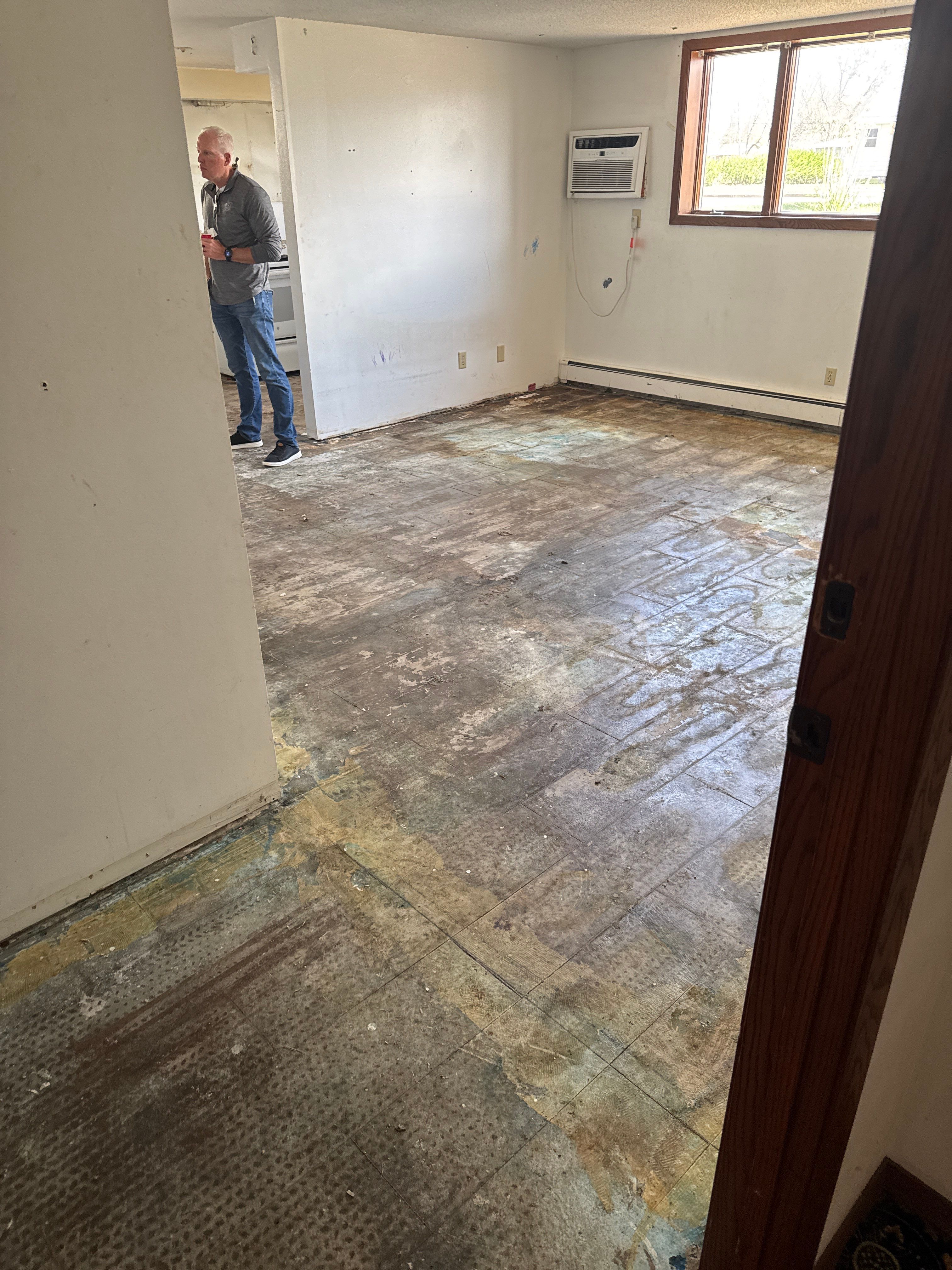 Commercial Subfloor Preparation and Flooring Restoration in Sioux Falls by Select Painting, Coatings & Garage Cabinets