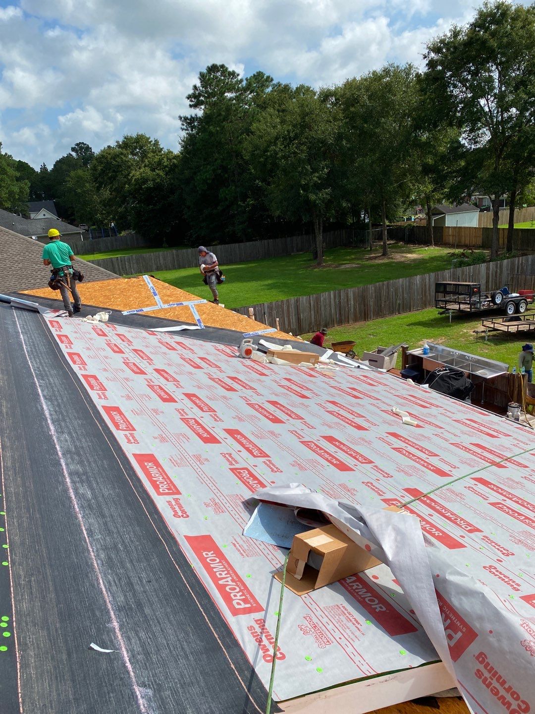 Commercial Roofing Installation using Roof Replacement by American Roofing & Construction LLC