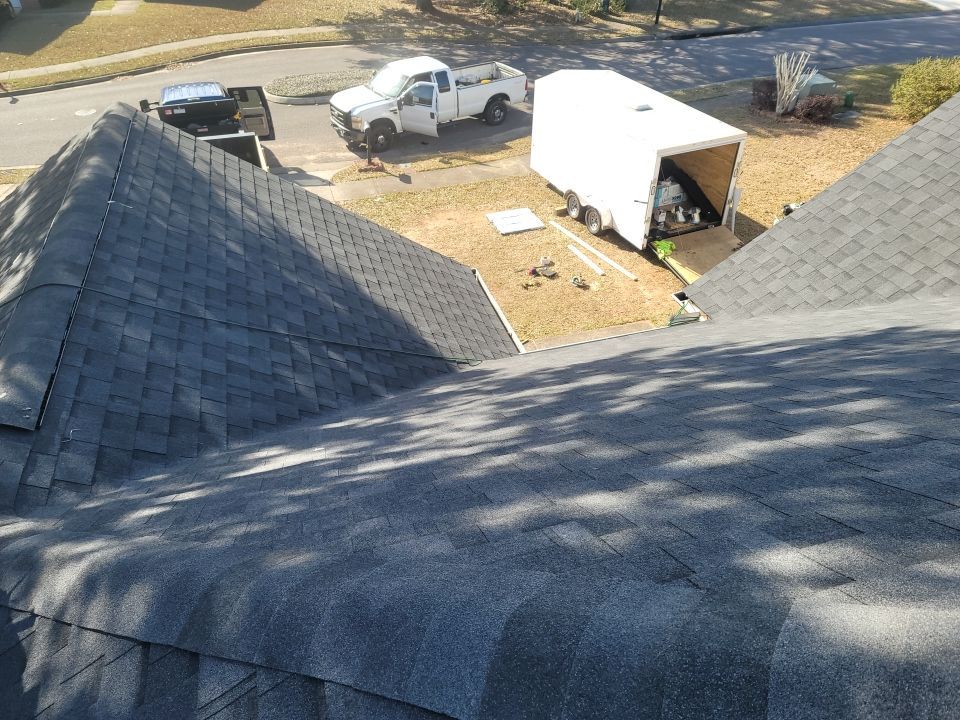 Residential Roofing Installation using Roof Replacement by American Roofing & Construction LLC