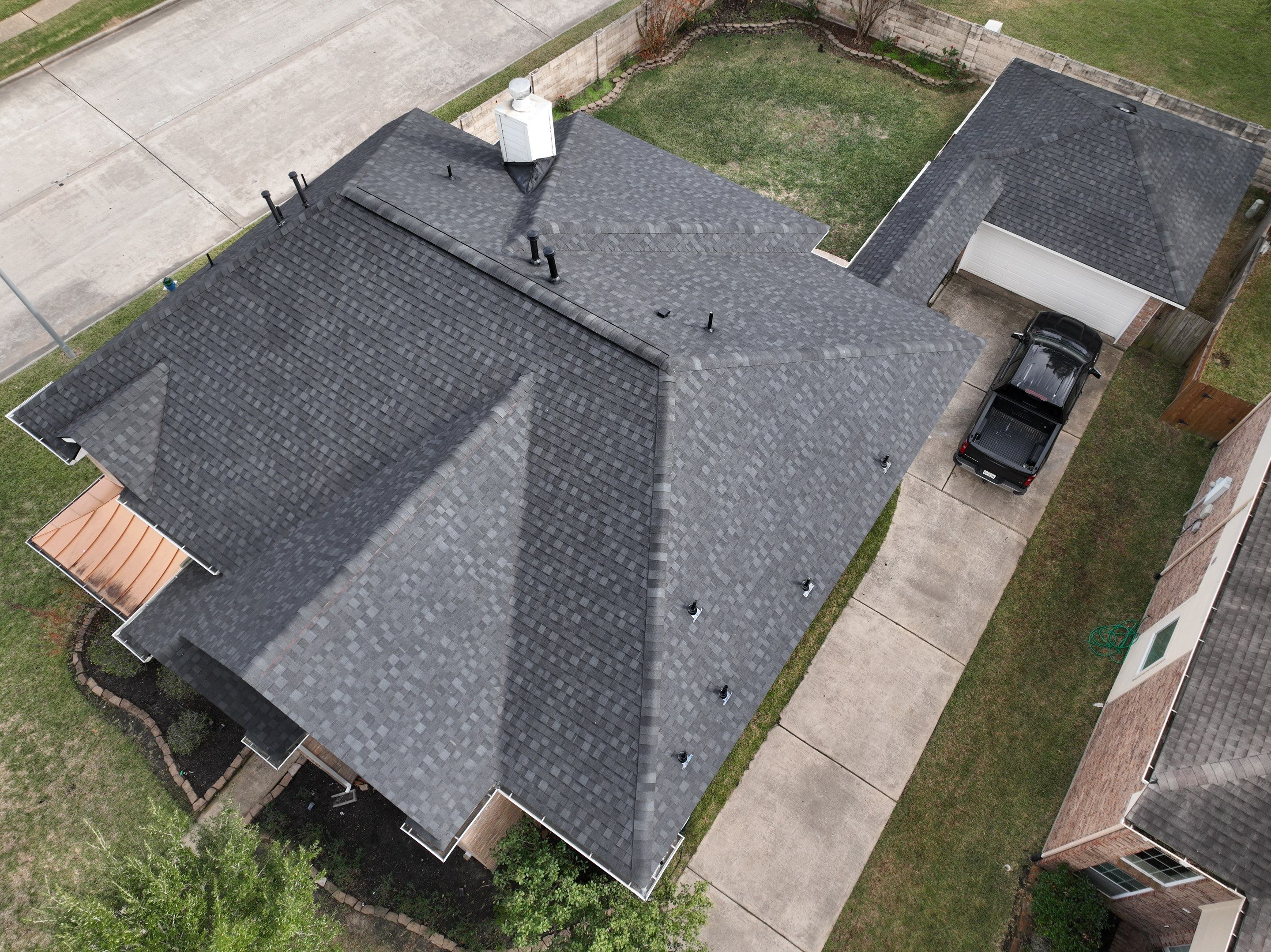 Tamko Titan XT - Rustic Black by Roof Concepts Construction