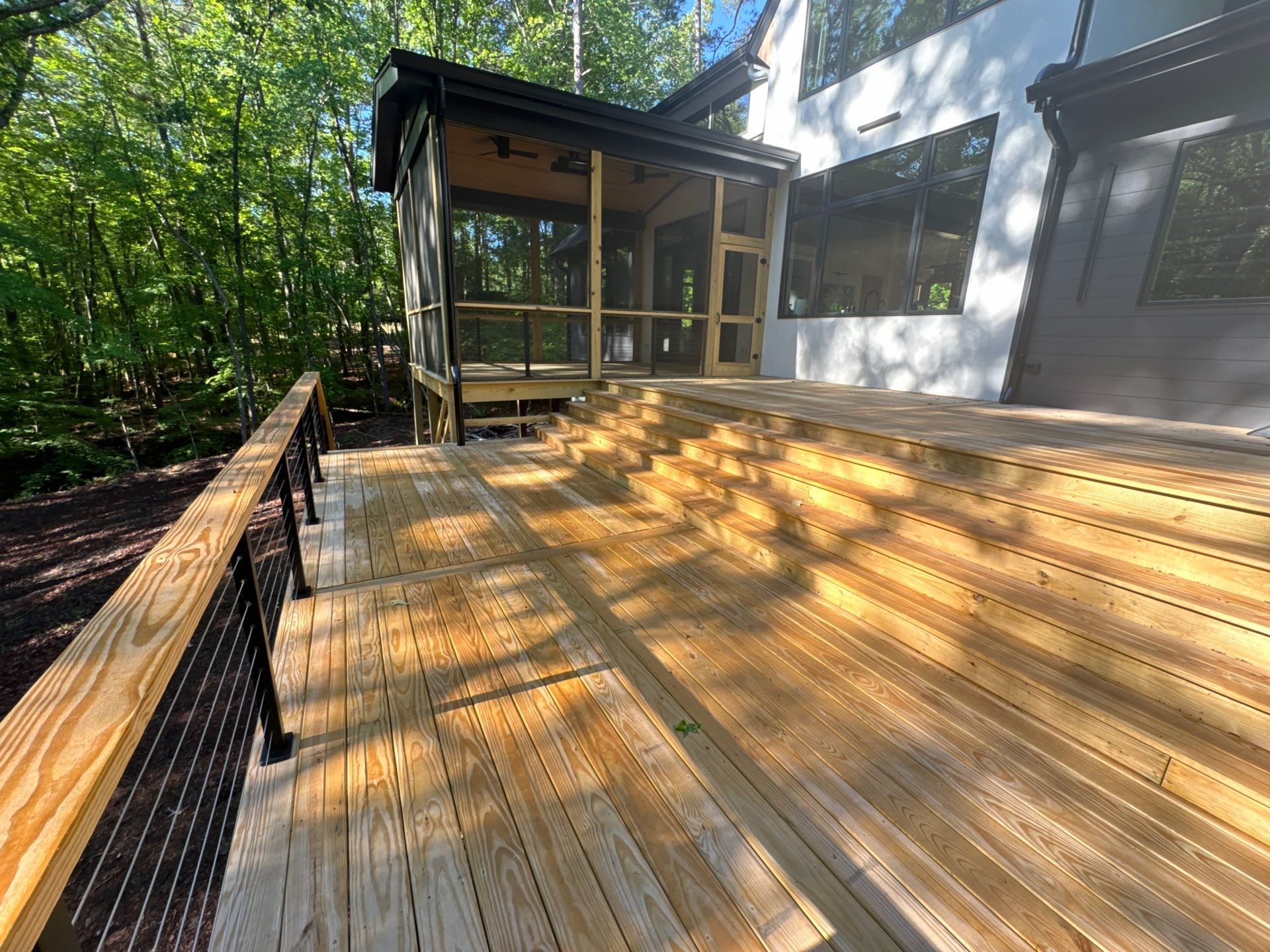 Porch and Deck staining  by GonzalezPainters & Contractors Inc 