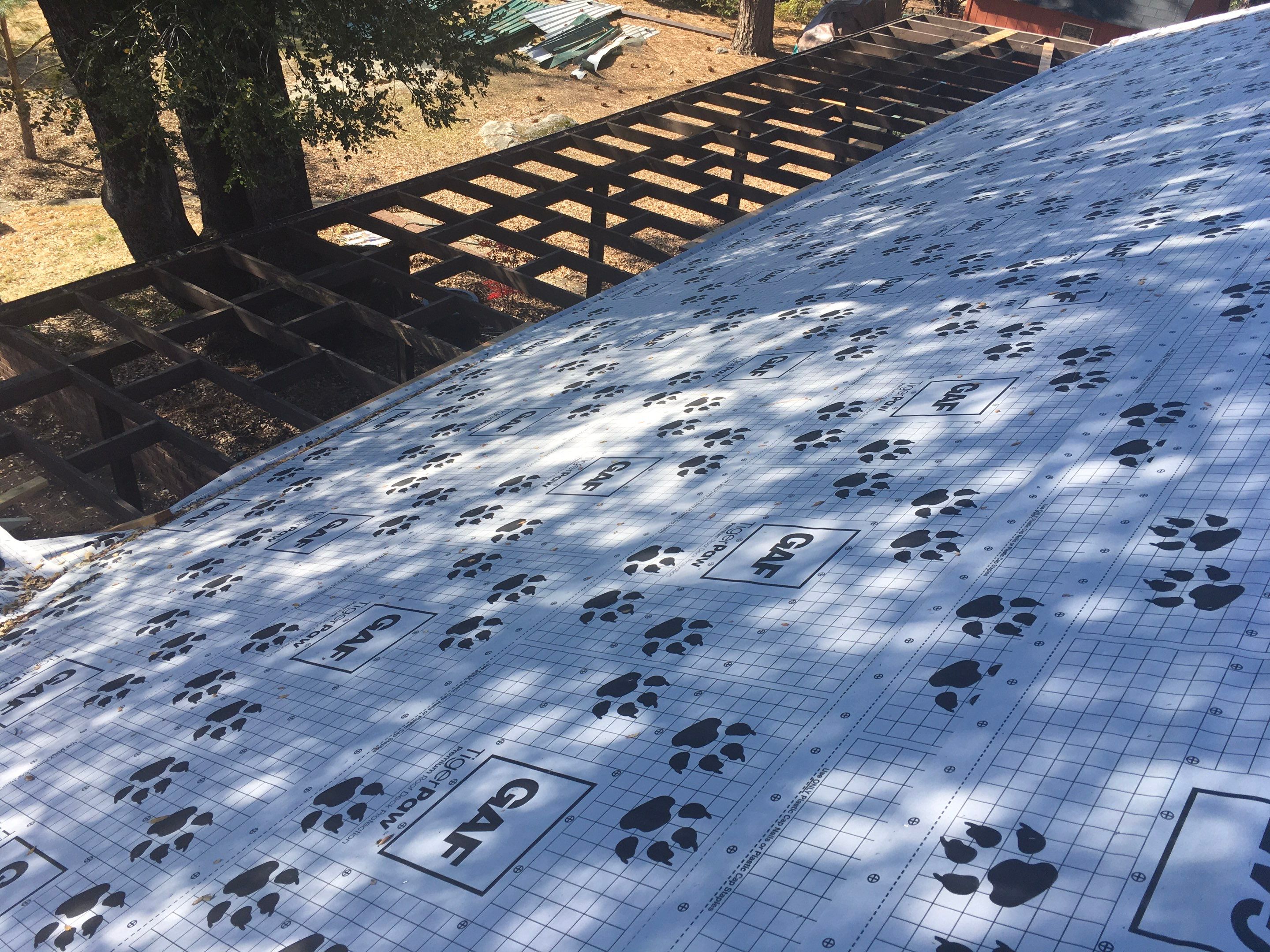 Metal roofing installation using Standing seam metal roofing system by Straight Edge Roofing Inc