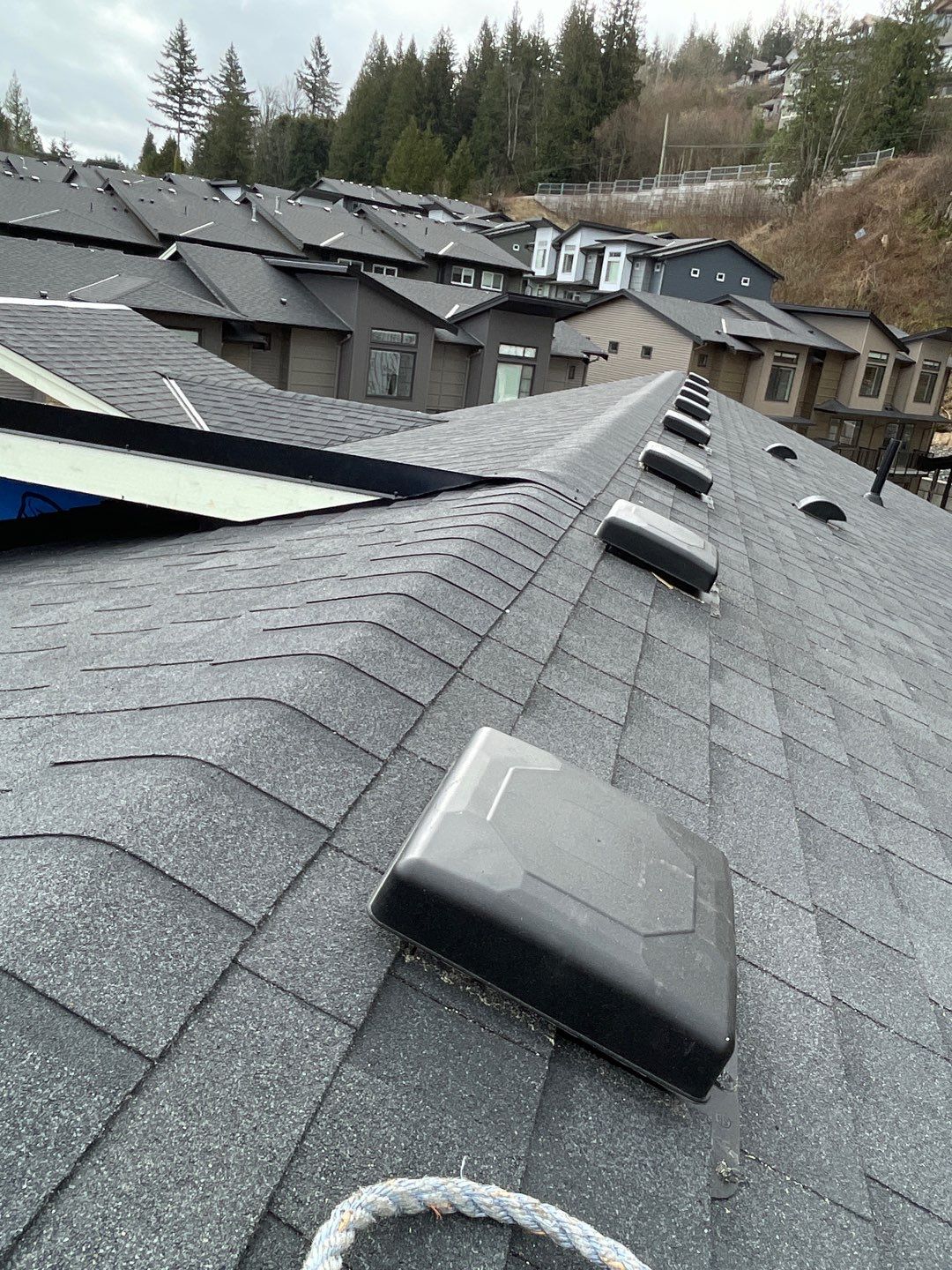 Residential Roofing Installation using OC Oakridge shingles by Top Notch Roofing Inc