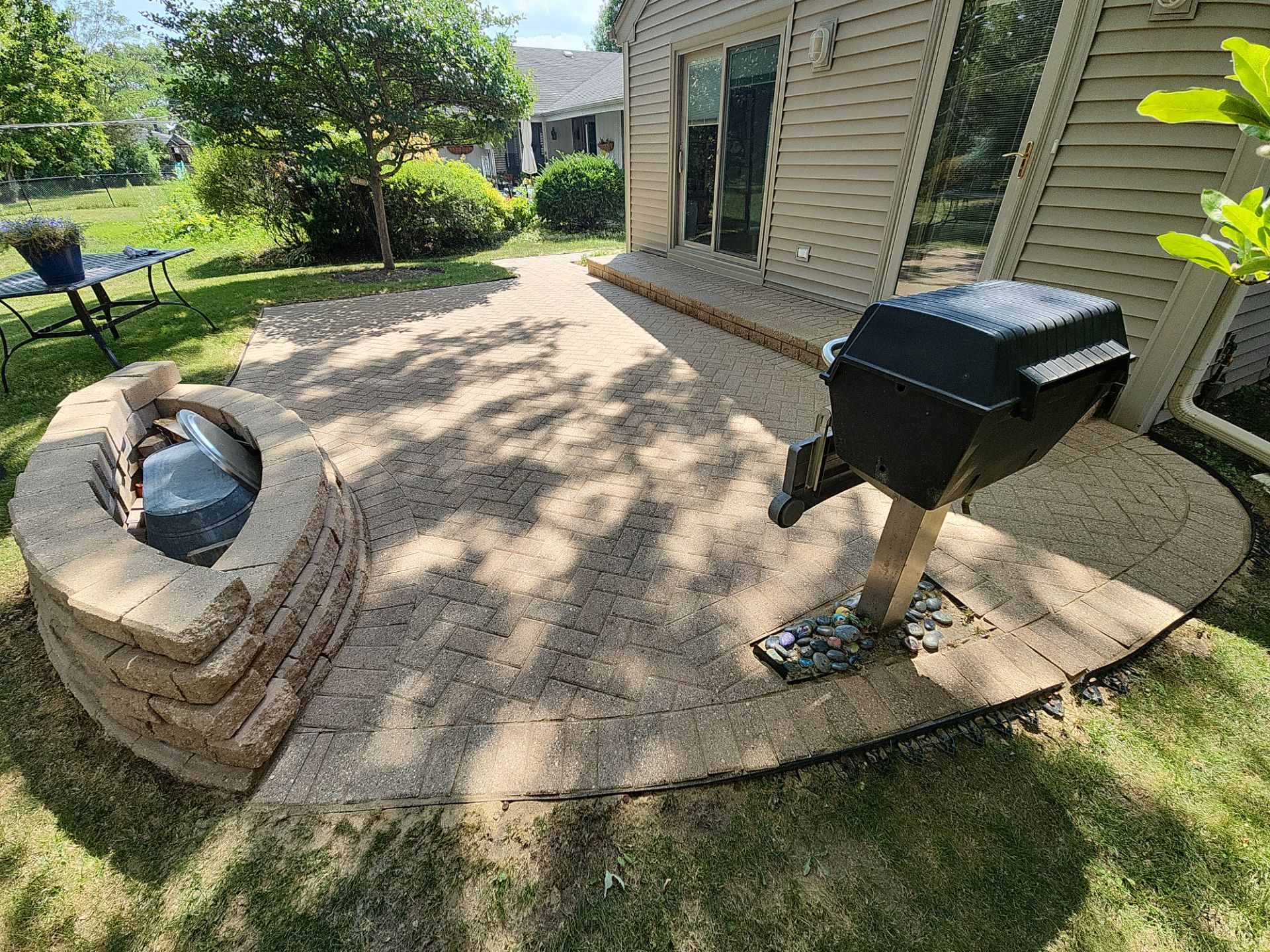 Arlington Heights Brick paver repair, cleaning and sealing by Northern Power Washing LLC.
