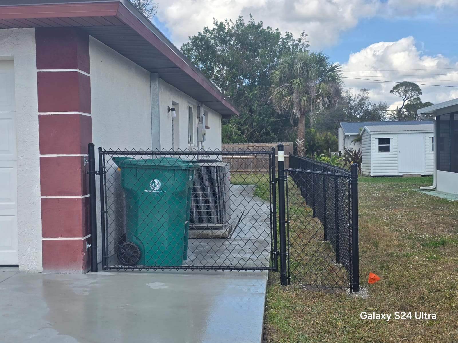 Black Chain Link Fence Installation for Port Charlotte Residence by True Fence LLC
