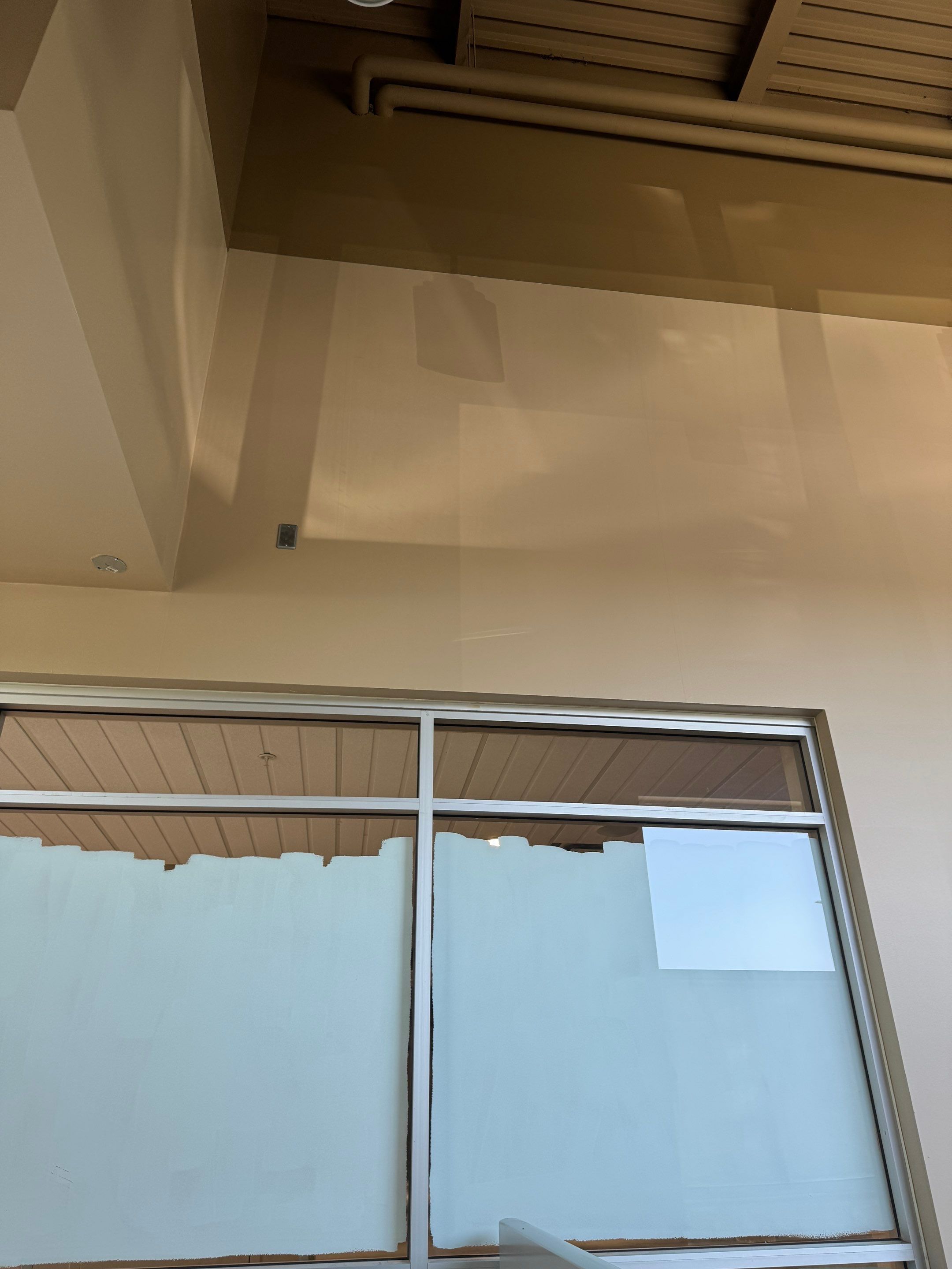 Commercial Prime & Paint Project-30ft height by YVR Construction Group