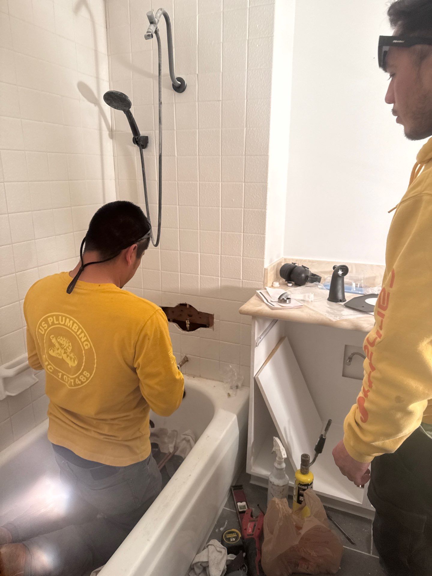 Installing Shower Fixtures  by Us Plumbing 
