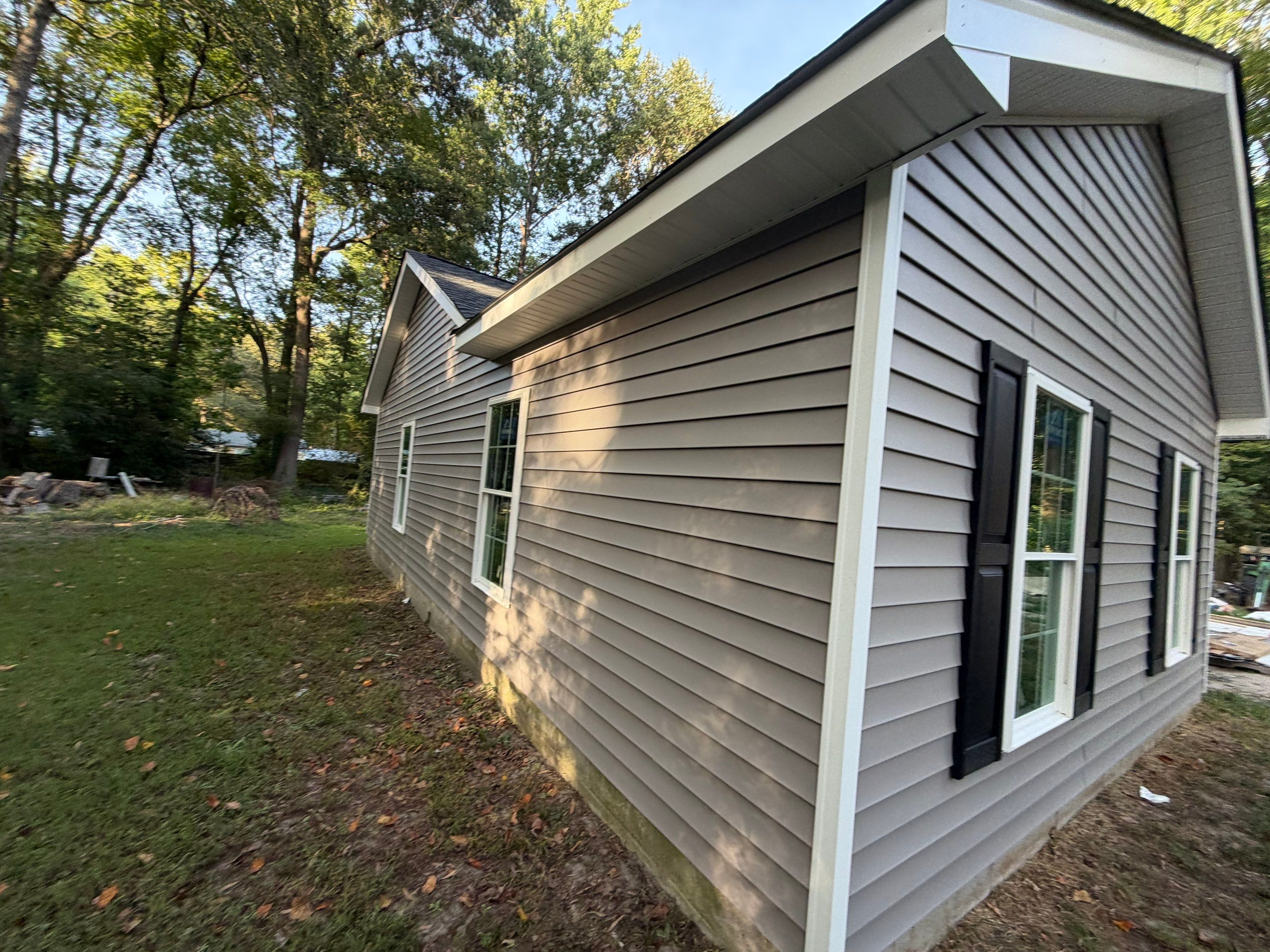 Single-Story New Construction Vinyl Siding Install in Gloucester by Cade Construction