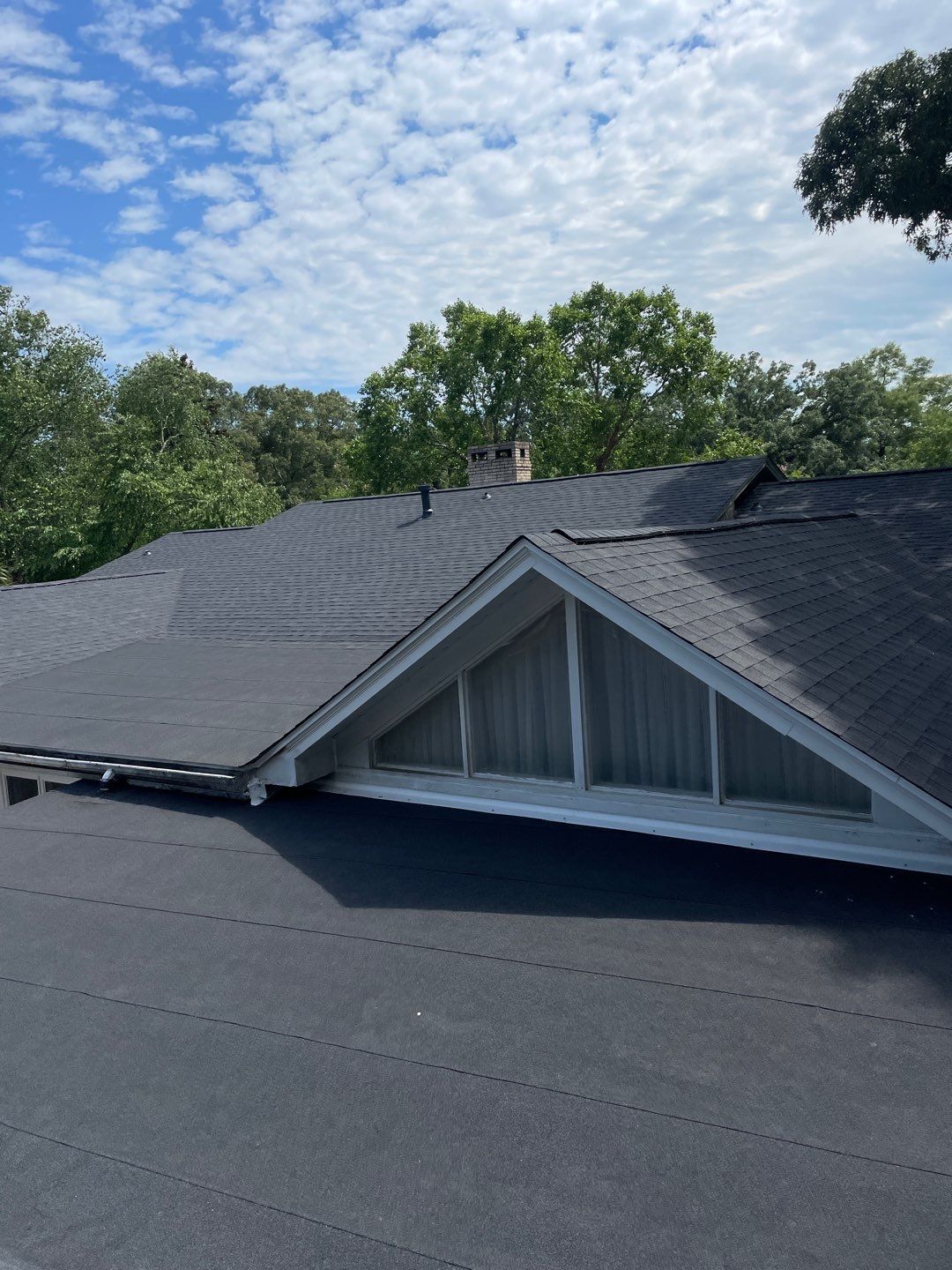 Residential Roofing Installation using Roof Replacement by American Roofing & Construction LLC