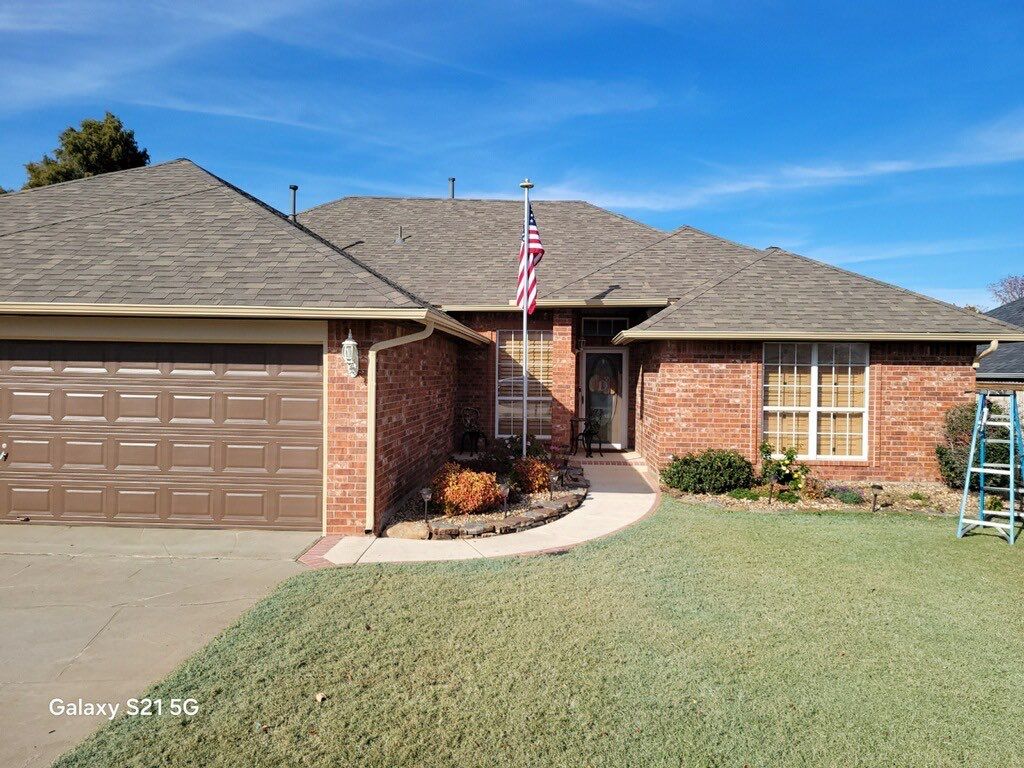 roof replacement & gutter installation in Midwest City by McCann's Roofing and Construction