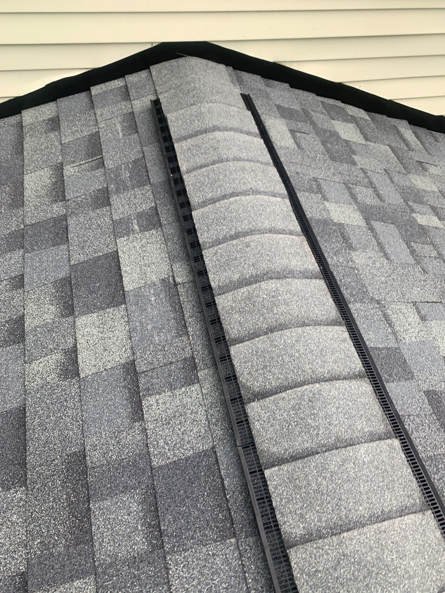 Roof, Siding, & Gutters by Absolute Roofing and Construction