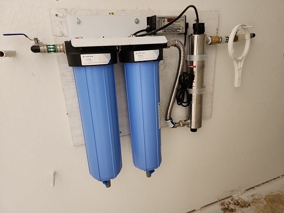 Residential Rainwater Collection System - Pioneer 40K gallon water tank in Mangrove Green by Hill Country Rain Water